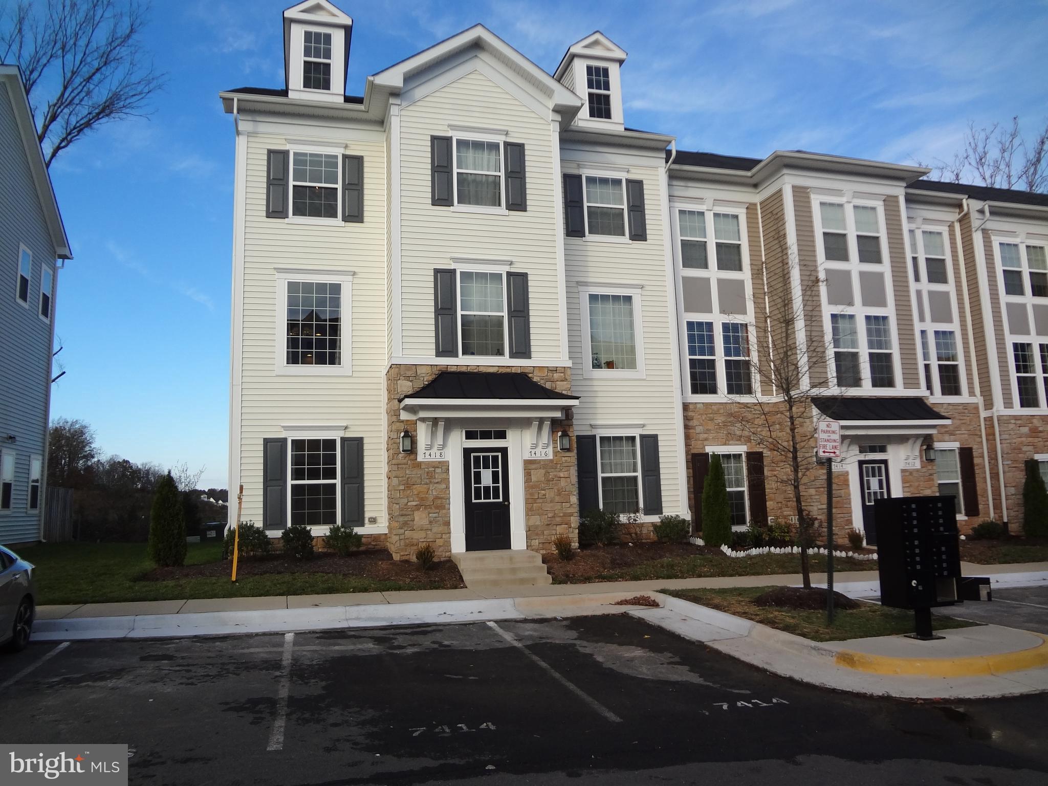 Must see end unit town home in desirable Falls Grove w/beautiful hardwood floors, 9 ft ceilings, fresh paint, stainless steel, custom granite,  2 master suites ea w/private bathroom, fully finished walk-out lower level w/1 additional bedroom with recreation room & full bath. Home is minutes to VRE/commuter lots, Rt28/I66, shopping/dining.
