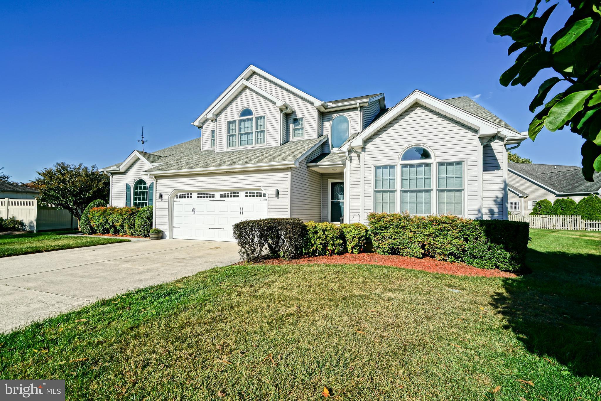 MOVE INTO TOWN! Lewes life is easy in this well-located & sprawling 5-bedroom home located on a quiet cul de sac lot in Pilottown Village. Spacious living features large rooms, high ceilings, hardwood flooring, and more! Enjoy an great floor plan with an accommodating country kitchen with upgraded granite countertops, central to the living & dining rooms, and a light-filled study with vaulted ceiling. The primary bedroom is a sanctuary of relaxation with a private en-suite bath with soaking tub; plus an accommodating walk-in closet. Four additional bedrooms on the 2nd level offer flexibility for a home office, guest room, or whatever suits your needs. Plenty of storage options are at your disposal with the 2-car garage with attached workshop & floored attic. Exterior highlights include beautiful landscaping with irrigation system, rear deck for entertaining and grilling, as well as an outdoor shower for rinsing off sandy days spent on the bay. Located only a short walk or bike ride to Downtown Historic Lewes and the dining, shopping, and scenic waterways and natural beauty that set Lewes apart. Love where you live! Call and schedule a showing today!
