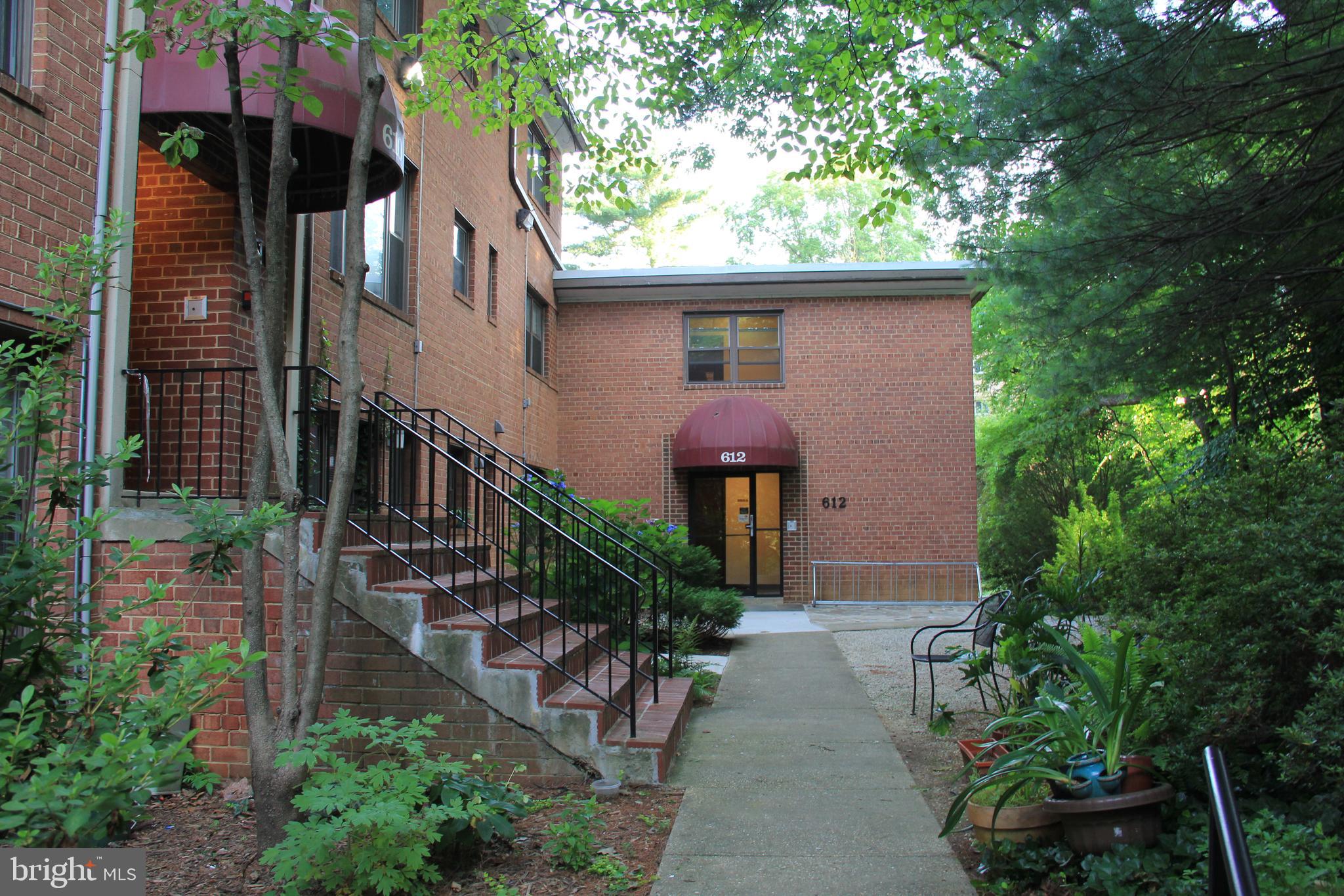 ALL UTILITIES INCLUDED.  Steps from Sligo Creek!   Easy to maintain 2  UPDATED  2BR apartment with ceramic floors and granite and stainless steel kitchen, full-size gas stove and side by side refrigerator.  Double entrance so you have an entrance inside to the laundry and outside to the parking lot.  Cats permitted with $40/month pet rent per pet.  Assigned parking available for $60/space/month.  Requirements are : NON-smokers ONLY (no vaping, smoking outside, smoking medical anything), cats accepted , credit score of 625 or higher, income (between any two incomes with good credit) of 75K or more, no bankruptcies, good rental history, clean criminal record, 4 people MAX.  The only other charge is a surcharge for A/C of 350/unit each summer (one time fee each year to defray extra electric charges).  Pleasant woodsy surroundings only half a block from Sligo Creek Parkway and bus stops at back of building about 100 paces from your exterior door.