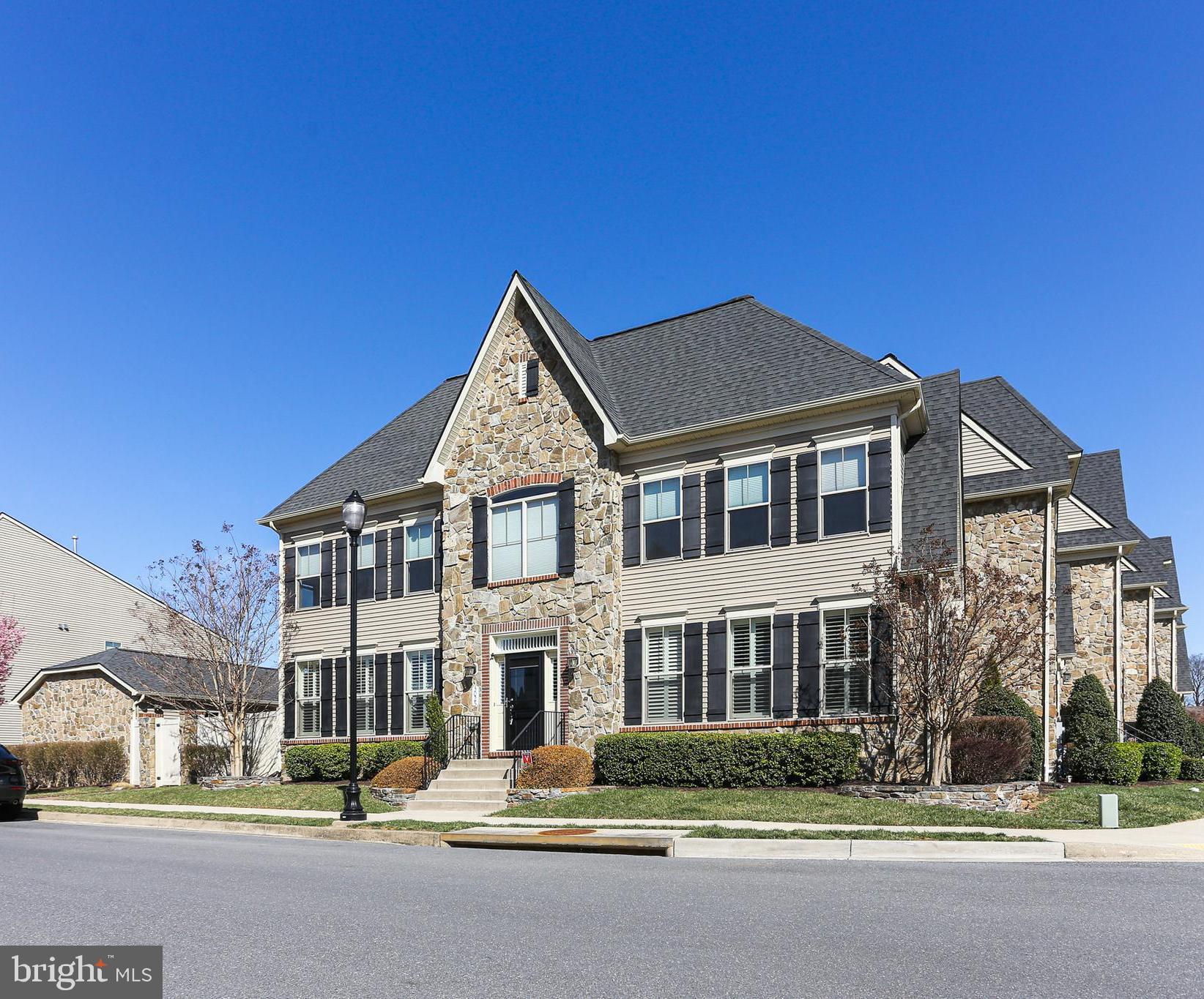 Welcome to this stunning luxury townhome located in the highly sought-after Worman's Mill Conservancy. Residents of this community enjoy access to exceptional amenities designed for an active lifestyle, including tennis and basketball courts, a clubhouse, and a putting green.

This meticulously maintained home offers a detached two-car garage and a spacious private patio. Elegant plantation shutters throughout the home add a sophisticated touch of Southern charm.

The spacious main level features a private primary suite designed for ultimate comfort and convenience. Upstairs, you will find two generously sized bedrooms, each equipped with its own walk-in closet, along with a large bathroom and a bright and airy den area perfect for relaxation or a home office.

The lower level includes a large family room, an additional full bathroom, and a substantial unfinished area offering significant storage space.