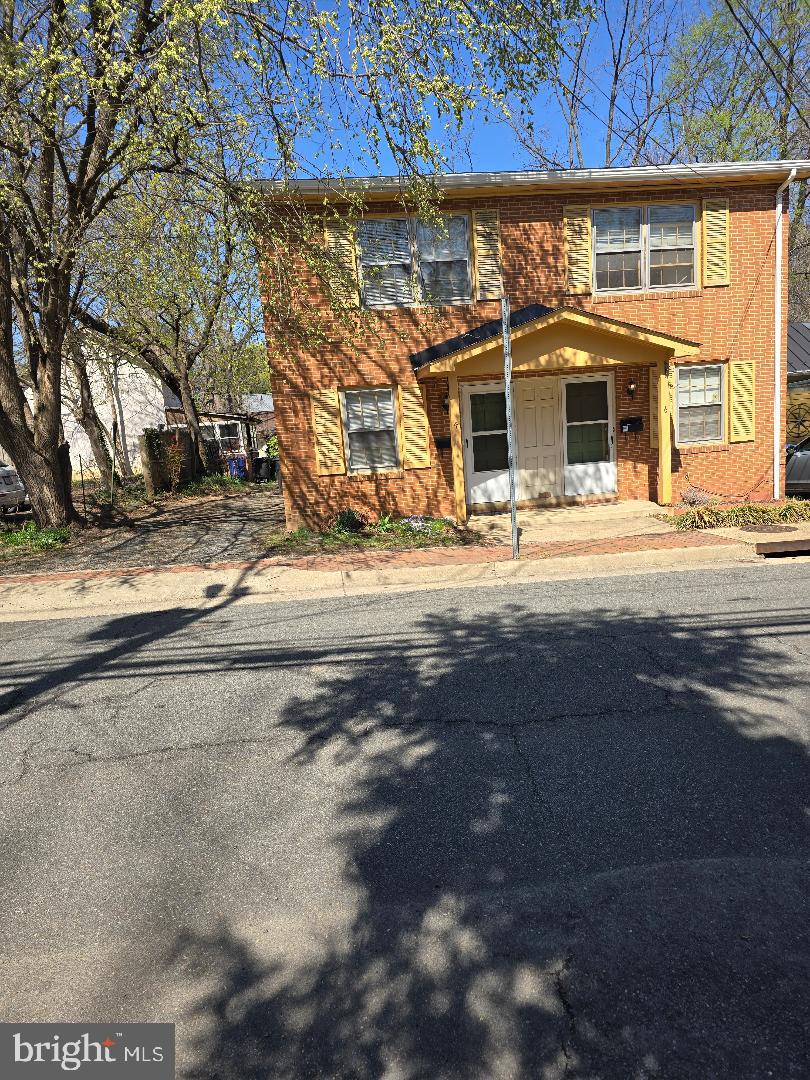 Want to be in downtown Leesburg than this is the home for you as a first time buyer or a fantastic investment Property. Property being sold as one Home.  You can live in one and rent out the other or Rent out both.
You are just minutes to downtown Leesburg  for shopping and so much more.
Both Units  have 2 Bedrooms , one full bath, Living room, Dining Area, Kitchen along with laundry room that  open to a small back yard but private.  Many windows .
Refrigerator, stove, ceiling fan (unit-4) , window  A/C units in  homes. Dishwasher in (Unit 6.) as well as garbage disposal (unit-6) . Both homes have washer and dryer.
Floor plan is the same in both Units. Hardwood flooring on main and Upper level.
Driveway Parking is used by Unit 4 . On street parking for Unit 6.