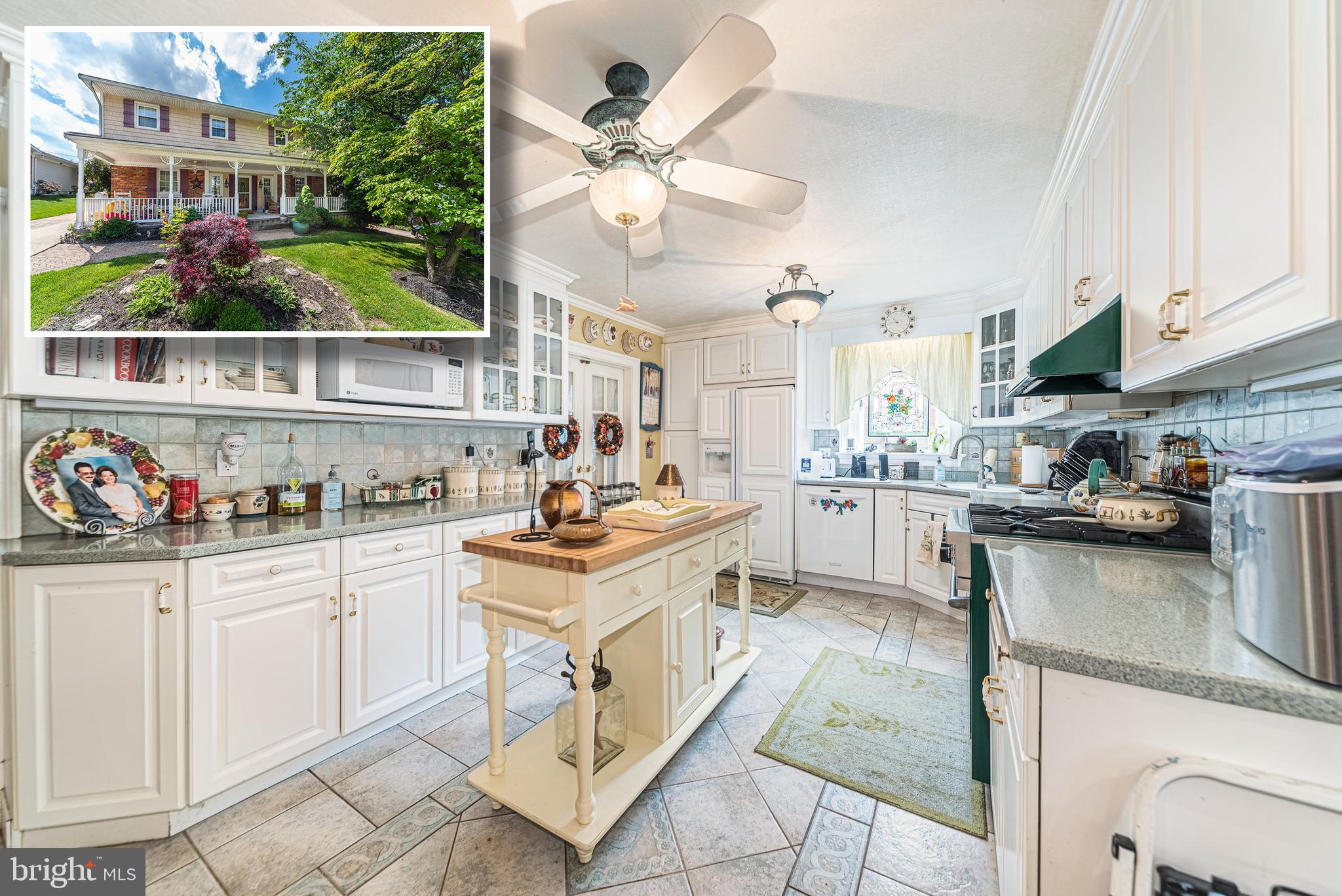 CHARMING AND SPACIOUS COLONIAL LOCATED IN THE SPRINGLAKE NEIGHBORHOOD WITH APPROXIMATELY 3,500 SQ. FT. OF LIVING SPACE!  Features include an inviting front porch with ceiling fans, hardwood floors throughout the upper levels, a formal living room, separate dining room with a fireplace, large eat-in kitchen with breakfast area and a Viking stove, expansive family room with tons of natural light and a wood burning fireplace, main level half bath, upper level with 3 bedrooms and 2 full baths including a Primary bedroom suite with a walk-in closet with built-ins and a full bath, finished basement with rec room with a 3rd fireplace, laundry room, a 2nd half bath, and 2 more additional rooms that would be perfect for an office or exercise room.  The rear yard features a long winding paver patio that is perfect for entertaining!  The neighborhood features active family events, community pool, is located within walking distance to the elementary school, and minutes from tons of restaurants and shopping!