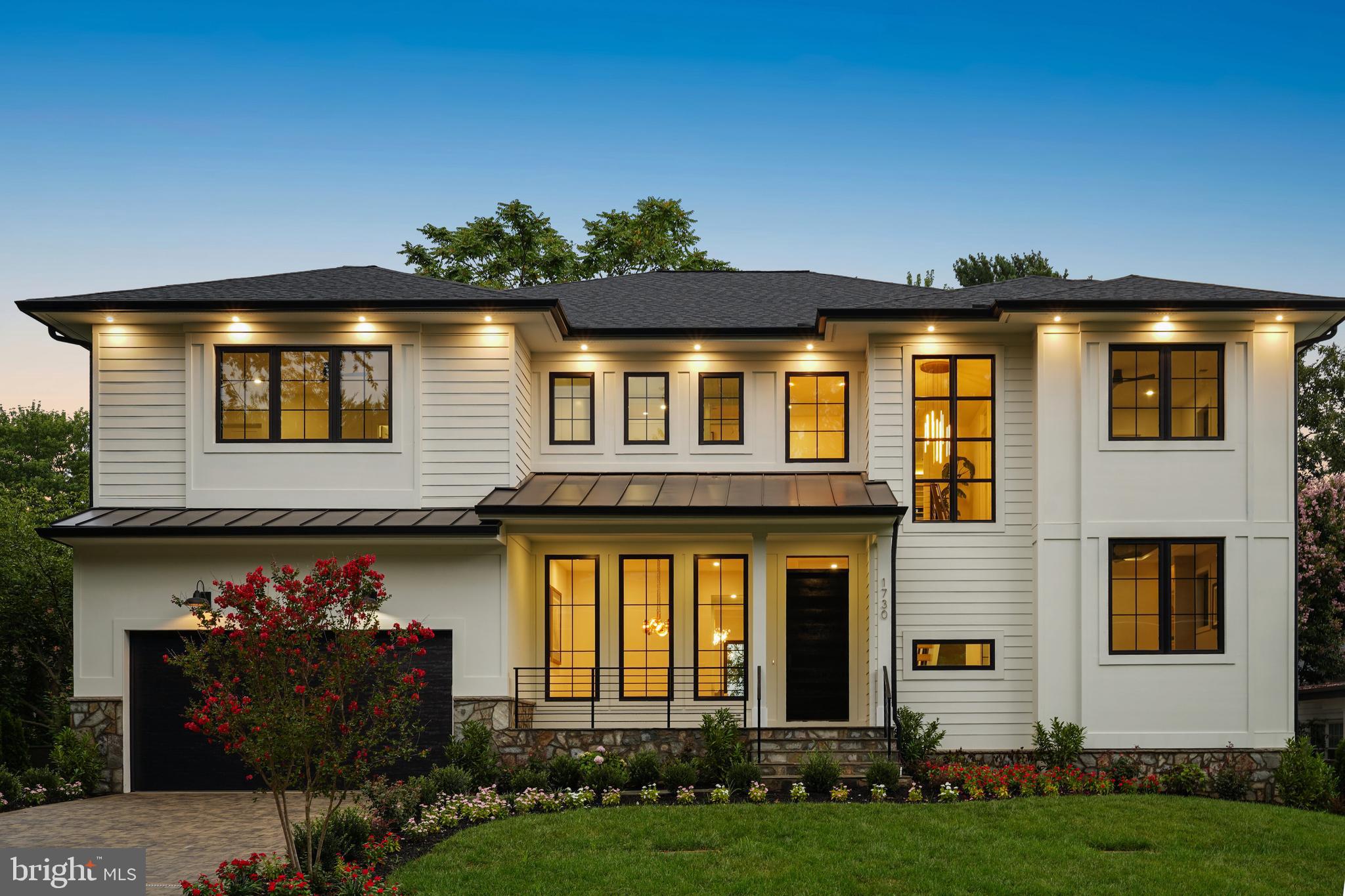An extraordinary offering in McLean’s El Nido Estates, 1730 Barbee Street is where form meets experience.  Built by HP Design & Build, this new residence stirs a quiet sense of wonder—where clean lines, natural light, and thoughtful luxury create a home that speaks softly, yet leaves a lasting impression.

Step inside and feel space unfold—10’ ceilings on main level, wide oak floors, and walls of glass that blur the boundary between indoors and nature. The kitchen is both thoughtful design and sanctuary, anchored by a striking quartz island and framed by chef-grade appliances. Flowing seamlessly into the family room, screened porch, and expansive deck, every space invites connection—and calm.

Upstairs, the primary suite is a retreat in every sense: a custom dressing room as refined as a boutique atelier, a fireplace flickering beneath a tray ceiling, and a spa-like bath with treetop views. Each secondary bedroom offers quiet character, with en-suite baths and intimate design details that invite rest and reflection.

Below, the walk-out level surprises and delights: media room, a full wet bar with garden views, and a covered patio that opens to a serene, private yard. A guest suite or flexible studio space complete the experience.

Just moments from parks, top schools, and the heart of McLean, this is more than a home—it’s a way of living. One you’ll want to return to, again and again.  We invite you to come and explore the possibilities! Total built square footage is approximately 7,688 inclusive of garage, mechanical room, screened-in porch, deck, rear covered patio, and porch.