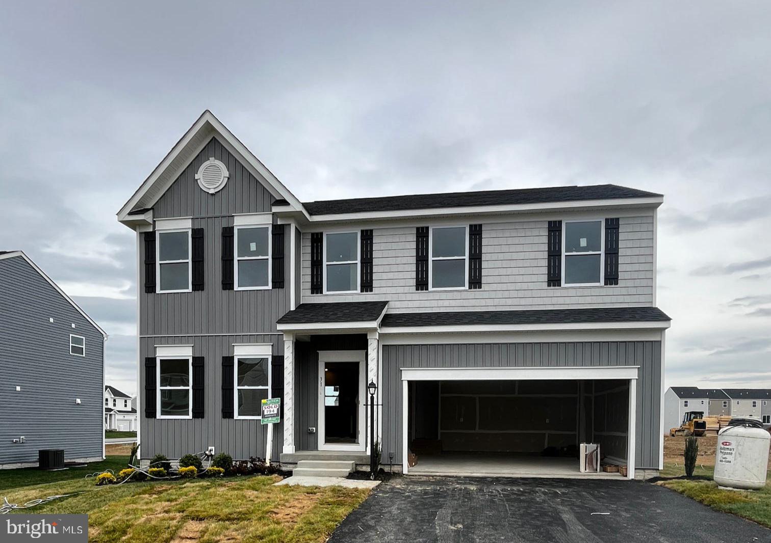 Welcome to this beautifully upgraded Dallas floor plan by Maronda Homes, located in the desirable South Brook community of Inwood, WV. This spacious home offers 4 bedrooms, 2 full and 2 half baths, and a finished lower-level recreation room with a walk-up to the rear yard, providing ample space for comfortable living and entertaining.​

The main level features luxury vinyl plank (LVP) flooring throughout, enhancing the open-concept design that includes a versatile flex space—ideal for a home office or playroom. The heart of the home is the upgraded kitchen, boasting stainless steel appliances, upgraded cabinets, and countertops, along with a cozy breakfast nook and a generous pantry. Adjacent to the kitchen, the family room is highlighted by a  fireplace, creating a warm and inviting atmosphere.​

Upstairs, the owner's suite offers a private retreat with a spacious walk-in closet and an en-suite bathroom. Three additional bedrooms, a second full bathroom, and a convenient second-floor laundry room complete the upper level.​

The finished lower-level recreation room includes a powder room and provides direct access to the rear yard, perfect for hosting guests or enjoying family activities.