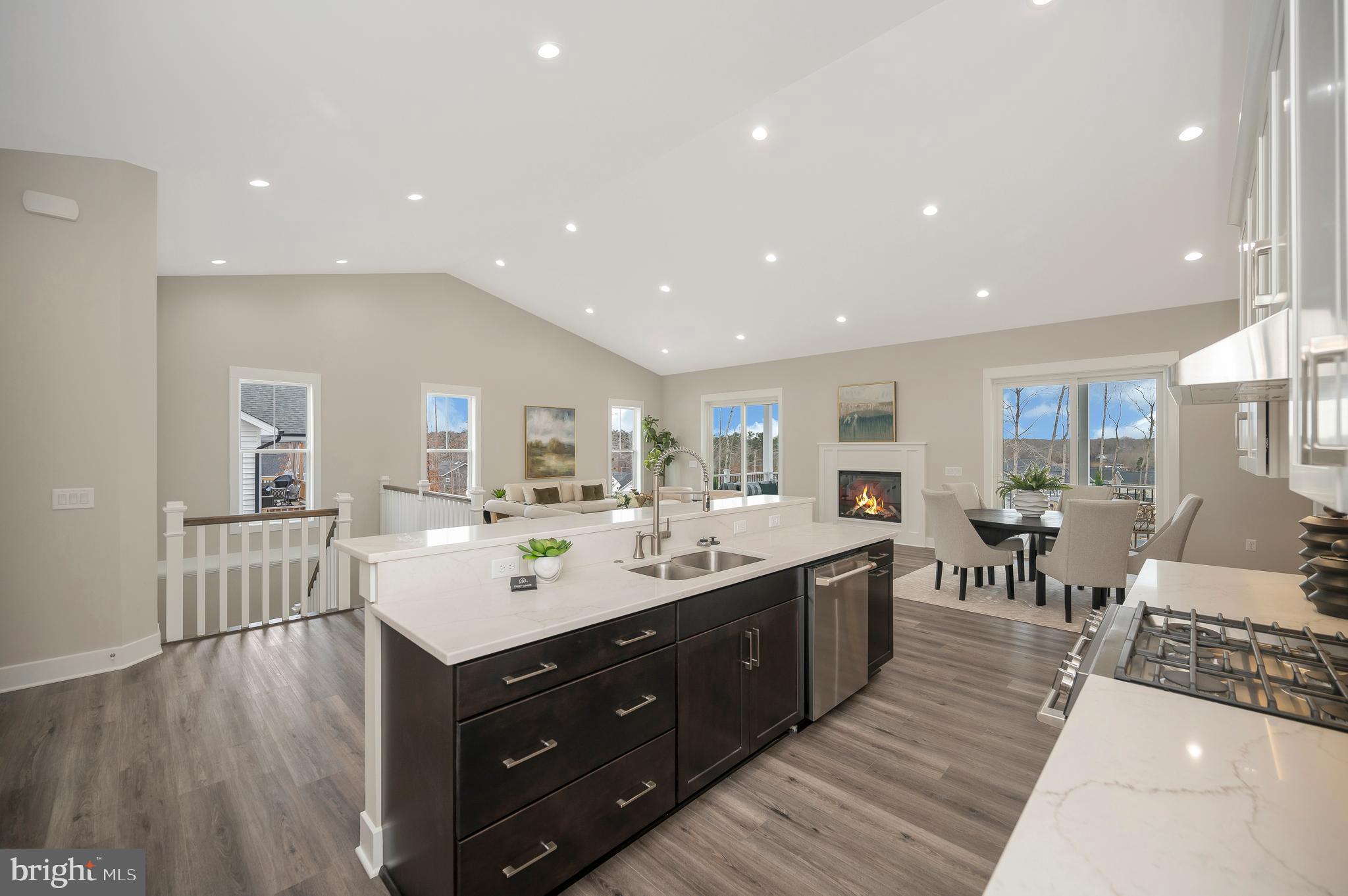 *OFFSITE MODEL* Experience the pinnacle of luxury lake living with this stunning 5,000 sq. ft. to-be-built home in the heart of Lake Anna (truly). Offering exclusive water access and a dedicated boat slip, this home is designed for those who crave both relaxation and adventure. The grand cathedral ceilings and expansive open floor plan create an airy, inviting atmosphere, perfect for entertaining and everyday living. High-end finishes, custom details, and luxurious living spaces ensure that every inch of this home exudes elegance and comfort. Thoughtfully designed for year-round efficiency and comfort, the home will feature a dual-fuel, dual-zoned heating system, allowing for precise temperature control across multiple levels. Buyers will also have the opportunity to personalize select finishes and design elements, allowing them to tailor the home to their unique style and preferences. Additionally, by securing their own construction loan, buyers can save both time and money while having more control over their financing options.

Beyond the home itself, the community offers an unparalleled array of resort-style amenities designed to elevate your lifestyle. Enjoy a professionally designed 45-hole disc golf course, a fitness center completed with TVs, and pickleball and basketball courts for endless recreation. The huge clubhouse serves as the heart of the community, featuring an entertainment center, beer tap, and gathering spaces perfect for social events. With 70 acres of maintained common area, you’ll have plenty of space to explore scenic walking trails and find your own private retreat. Whether you're spending your days on the water, enjoying the community’s incredible amenities, or simply unwinding in your beautifully designed home, this property offers the perfect balance of activity, luxury, and privacy. Don’t miss the chance to bring your dream home to life. Come by our off-site model to get a real feel of your future home! We have multiple lots available to really make your dream come true. Be sure to see the virtual tours and documents!