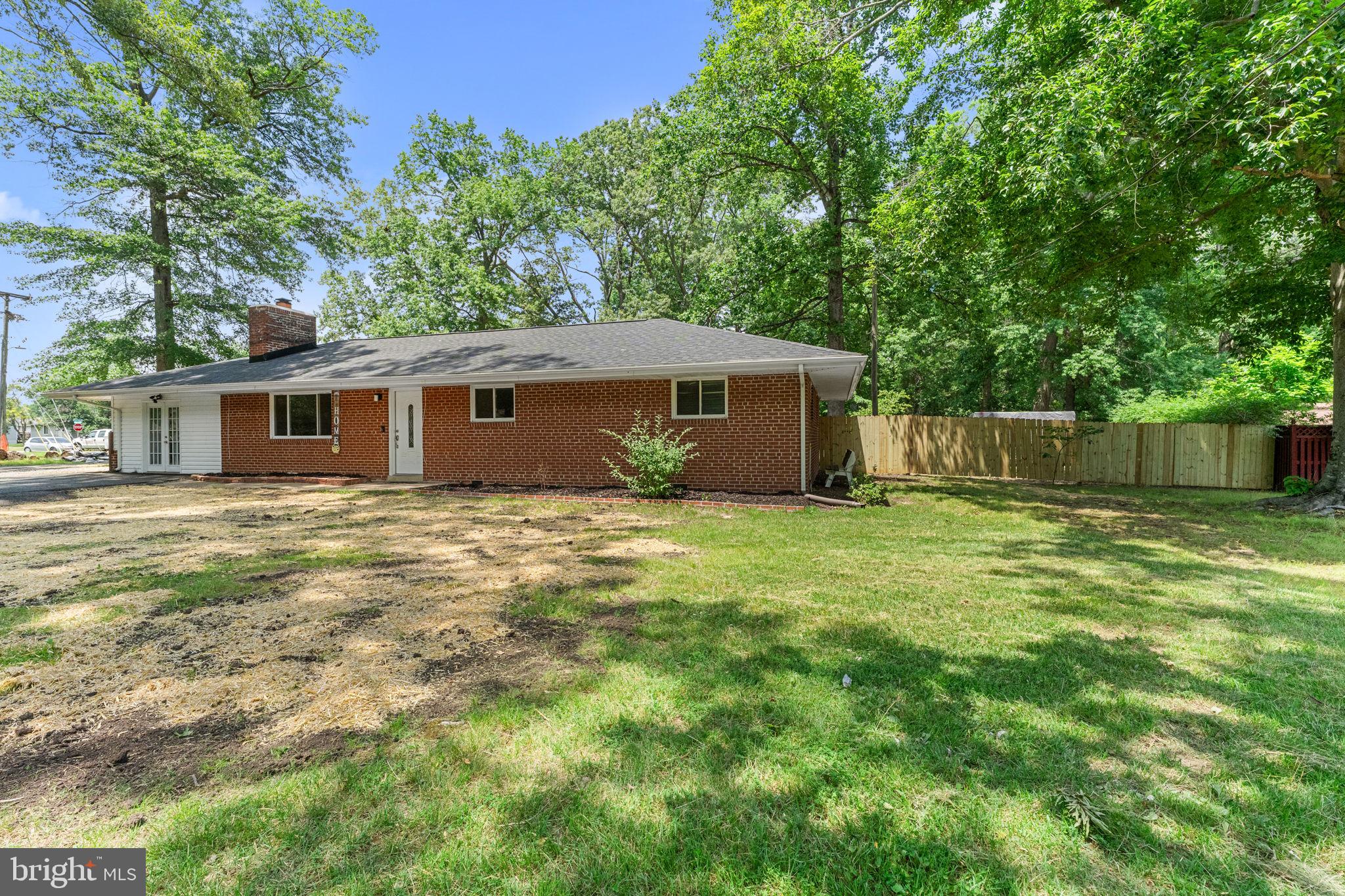 Rare opportunity to own an updated brick rambler on a spacious 0.54-acre lot with **NO HOA** and an
**ASSUMABLE VA LOAN at an incredible 2.25% interest rate for qualified VA buyers**. This well-maintained
home offers comfortable one-level living with updated kitchen and baths, modern flooring, and numerous
improvements including; new roof, fresh paint, new fixtures, new hardware,  updated landscaping, newer windows and AC unit, and a fully  encapsulated crawlspace with dehumidifier. The fully fenced backyard provides plenty of space for entertaining, gardening, pets, or future outdoor amenities. Ideally situated in an established neighborhood with mature trees and larger lots, this property combines privacy and convenience. Located just minutes from Marine Corps Base Quantico, Virginia Railway Express service at Quantico, I-95, Route 1, shopping, dining, and recreation at Prince William Forest Park. Easy access to Northern Virginia, Washington, D.C., and major employment centers makes this an exceptional option for commuters, military personnel, and anyone seeking a blend of convenience and outdoor living.
Don't miss this unique opportunity to secure a move-in-ready home with a large yard, no HOA restrictions,
and the potential benefit of a low-rate assumable VA mortgage.