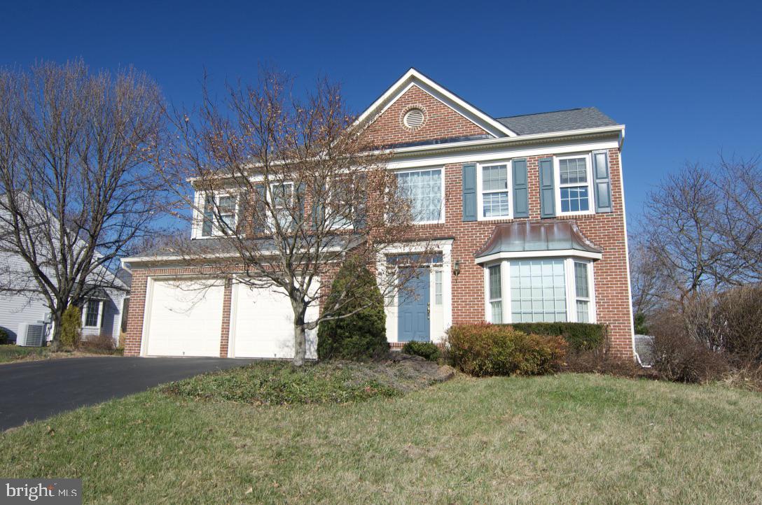 LOVELY Classical brick colonial home in sought after Arrowood boasts 4 bedrooms/2 1/2 baths and lovely yard with mature trees.  Freshly painted throughout, this home has large spaces for entertaining, a gourmet kitchen, master suite with jacuzzi tub and dual sinks and walk-in closet.  A MUST SEE!