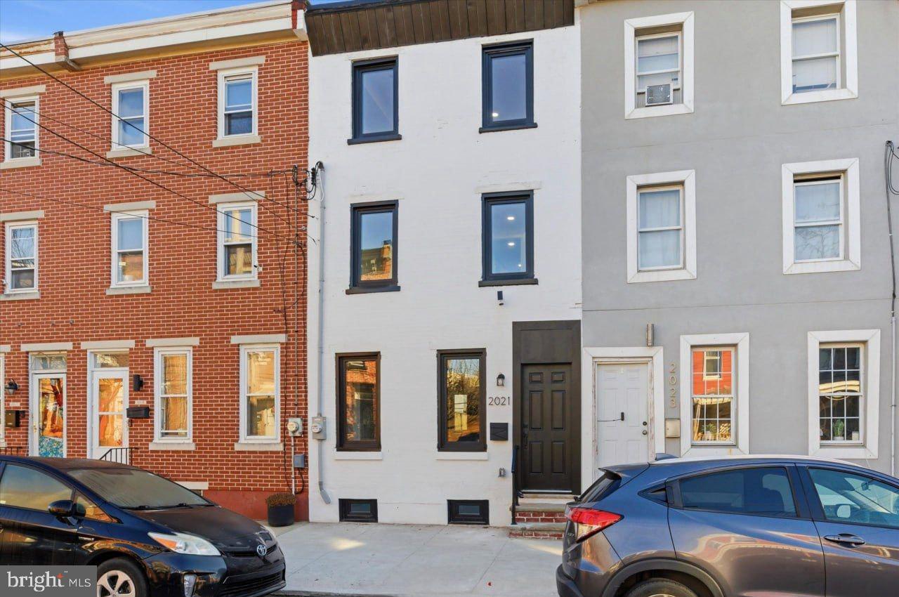 STOP SCROLLING — THIS IS THE ONE.
A fully reimagined 4 BD / 2.5 BA stunner in the heart of 19125, complete with an approved 10‑year tax abatement, designer finishes, and every major system upgraded. Homes like this don’t just hit the market — they make an entrance.
Welcome to 2021 E Sergeant Street, where modern efficiency meets elevated style, and where the money you don’t spend on property taxes stays exactly where it belongs: in your pocket.
THE RENOVATION: Not a flip. A transformation.
This home was rebuilt with intention — from the European windows to the dual high‑efficiency HVAC systems, to the fully updated electrical, plumbing, and mechanicals. Every inch has been touched, refined, and elevated. This is the kind of renovation that feels solid the moment you walk in.
THE MAIN LEVEL: Bright, open, and beautifully executed.
Step inside to a sleek straight‑through layout with wide‑plank LVP flooring, sun‑filled living space, and a dining area that actually fits real furniture. The kitchen is a showpiece: quartz countertops, marble backsplash, premium stainless‑steel appliances, shaker cabinetry, modern fixtures + finishes.
A stylish first‑floor powder room adds everyday convenience — a rare and valuable feature in this neighborhood.
THE BEDROOMS: Four real bedrooms. Zero compromises.
The second floor offers three bright, generously sized bedrooms and a beautifully updated full bath. No awkward layouts. No “technically a bedroom” situations. Just real, functional space.
The entire third floor is your private primary suite — complete with a spa‑inspired en‑suite bathroom featuring elevated tilework, contemporary fixtures, and a walk‑in shower that feels like a boutique hotel.
THE SYSTEMS: Efficiency = savings.
This home is built to perform:
Dual high‑efficiency HVAC units (heat/cool floors independently)
New hot water heaters
European windows for insulation + noise reduction
Fully updated electrical + plumbing
Translation: comfort, lower utility bills, and peace of mind.
THE EXTRAS: Storage + convenience.
An oversized crawlspace provides excellent storage — keeping your living areas clean, open, and clutter‑free.
THE LOCATION: 19125 — where everyone wants to be.
Minutes from I‑95, Fishtown hotspots, and Center City, this home sits in one of Philadelphia’s most desirable and fastest‑growing neighborhoods. Walkable, bike‑friendly, transit‑connected — everything you need is right outside your door.
LET’S BE HONEST:
A fully renovated home with four bedrooms, 2.5 baths, luxury finishes, brand‑new systems, and a 10‑year tax abatement — at this price point — is almost unheard of in 19125. The buyers who hesitate will be watching someone else move in.
Schedule your private showing today — before this one is gone.
