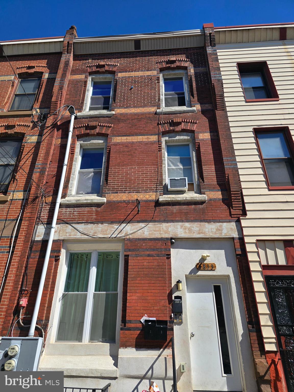 3+3+4 ; Legal triplex with a total of 10 bedrooms and 10 bathrooms. of Originally constructed in 1950, the property has been effectively modernized, enhancing its appeal and functionality while maintaining its architectural integrity. The interior row townhouse design features a fully finished basement, providing additional living space that can be leveraged for rental income or as a communal area. The contemporary architectural style, combined with durable masonry construction, ensures longevity and reduced maintenance costs, making it an attractive option for discerning investors. With no association fees and on-street parking available, this property offers flexibility and convenience for tenants, further enhancing its rental potential. The absence of a pool and other costly amenities allows for lower operational expenses, maximizing net returns. Investors will appreciate the strategic location near Temple University, which consistently attracts a robust rental market. The property's effective year built of 2019 signifies that major systems and finishes are relatively new, reducing immediate capital expenditure concerns. This asset not only promises steady cash flow but also positions itself for potential appreciation in value, driven by ongoing demand in the area. Seize this opportunity to enhance your portfolio with a property that combines modern living with investment viability.