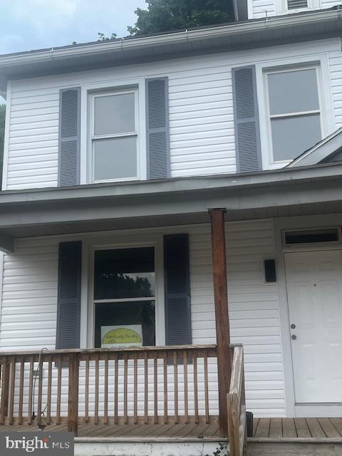 BACK ON MARKET (Buyer moved for dream job before settled)  Homeowner/Investors:  Completely renovated including New Roof, New Vinyl Siding, semi-detached  with new Bath, Kitchen with Tile Backsplash , SS Appliances, W/D, Flooring and Lighting Fixtures.  All done in a modern theme.  HP/CA newly installed.  Easily converted to include a 4th bedroom, 2 bath.  Will Install both for full price offer..  Nice size bedrooms and bath w/dble vanity.   Possible 5th bedroom with room to expand in walk up attic as well as adding third bathrooms.  Larger than it looks!  Great income Potential.  Take a look! Possible Seller help as well.  Please note:  Listing agent half owner of property.