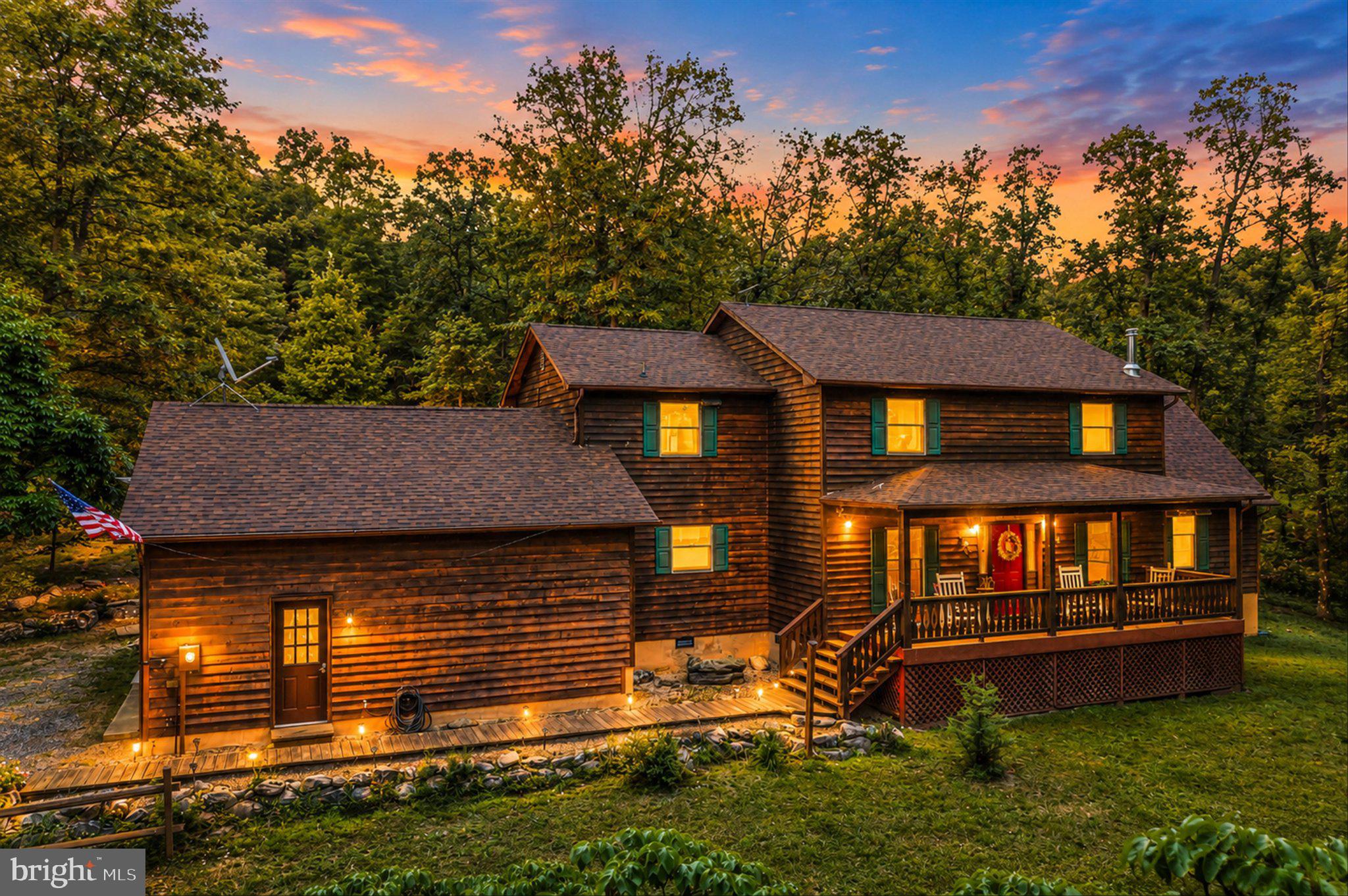 This custom Cape Cod offers approximately 2,600 square feet set on an incredible 42-acre wooded property with a pond, plus an additional 6-acre parcel included in the sale.  All 48 acres are unrestricted. The home features a spacious main-level primary suite, while the upper level offers two large bedrooms along with a versatile office or sitting area that opens to a private deck. The property has been thoughtfully updated and maintained, including a fully updated kitchen (2025), all new appliances (2022), new washer and dryer (2023), whole-house interior paint (2025), new water treatment system (2023), new upper zone heat pump (2022), and new AC condenser (2023). Additional highlights include dual-zone heat pumps, a wood stove, and a new roof (2022). Outside, enjoy your own private retreat with an above-ground pool installed in 2023, a tree stand built in 2023, and cleared trails winding through the acreage - perfect for recreation, exploring, or future possibilities. With abundant wildlife and potential for additional homesites or subdivision, this one-of-a-kind property offers the perfect blend of comfort, privacy, and opportunity.