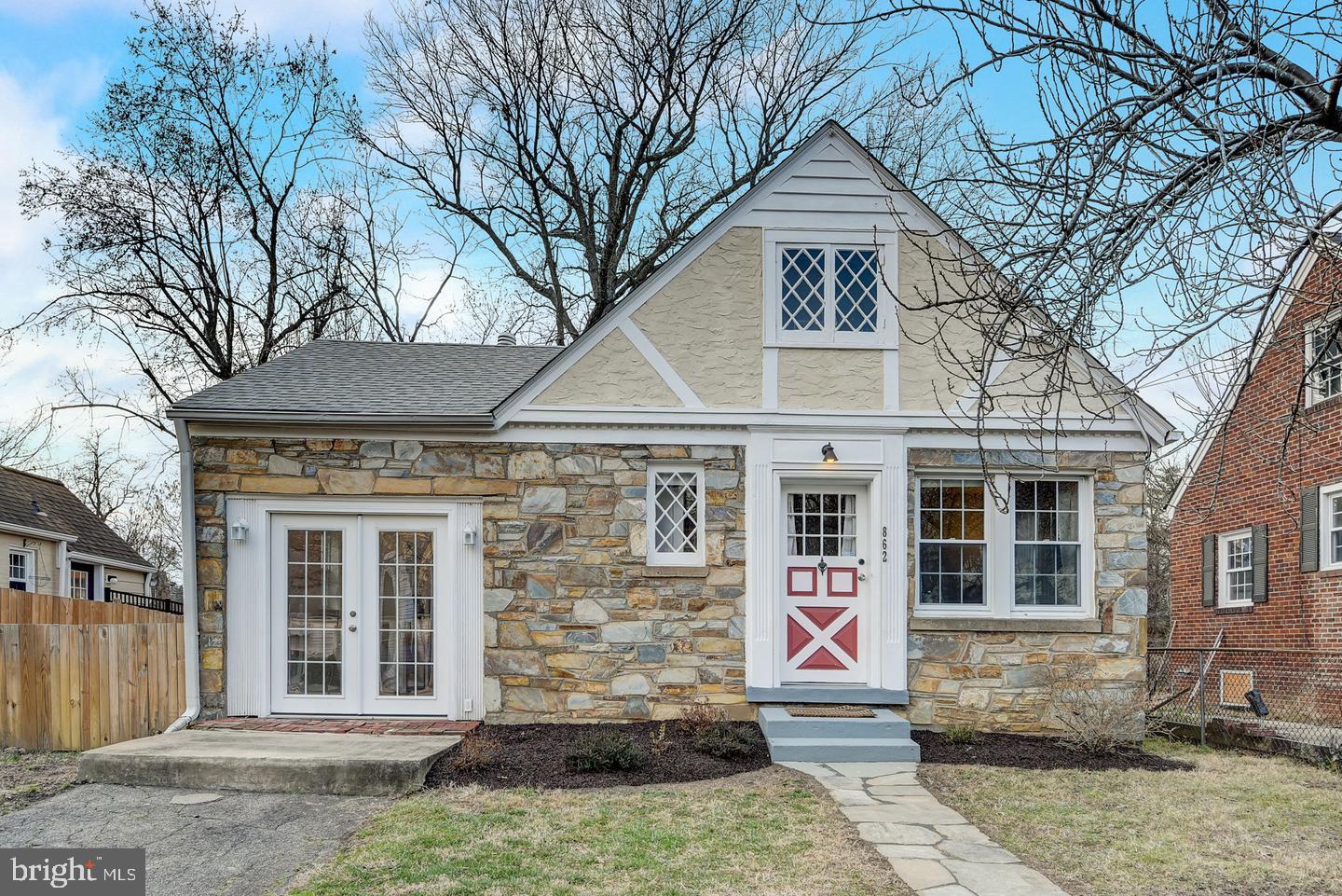 NEW LISTING!  Please contact Agent for ONLINE APPLICATION LINK.   THE OWNER IS LOOKING FOR APPLICANTS WITH APRIL OR MAY LEASE START DATE.  ONE SMALL DOG considered CASE BY CASE -- with Fee + Deposit.  
Steps to Ballston Retail, Restaurants,  Entertainment.    Adorable stone cottage backing to park space and W & OD Trail.   3 bedrooms on one level  - one is the main bedroom, one is the back porch with pull down Murphy bed, and one is the side porch.     
Large bonus room 2nd floor upstairs, (low ceiling height) perfect for kids play area or great storage space!   
Newly Renovated Kitchen with Gas cooking and Granite counters.   Updated 1.5 baths.  In home Stacked washer/dryer system.  Newer windows. Rear Fenced yard with deck. Note:  Shed is not for tenant use, owner uses this.    Driveway off street parking space.    Steps to Ballston Quarter, Pupatella, Arlington Forest Club (pool & tennis), bike trails, parks, Lubber Run Community Center, commuter routes, DCA Airport.    Quick access to to 66, 395, Rt. 50, Ballston Metro, DC and bike trails.   No Smoking.   Minimum 12 month lease.  
One small Dog,  case by case, with fee + deposit.  Welcome Home!!