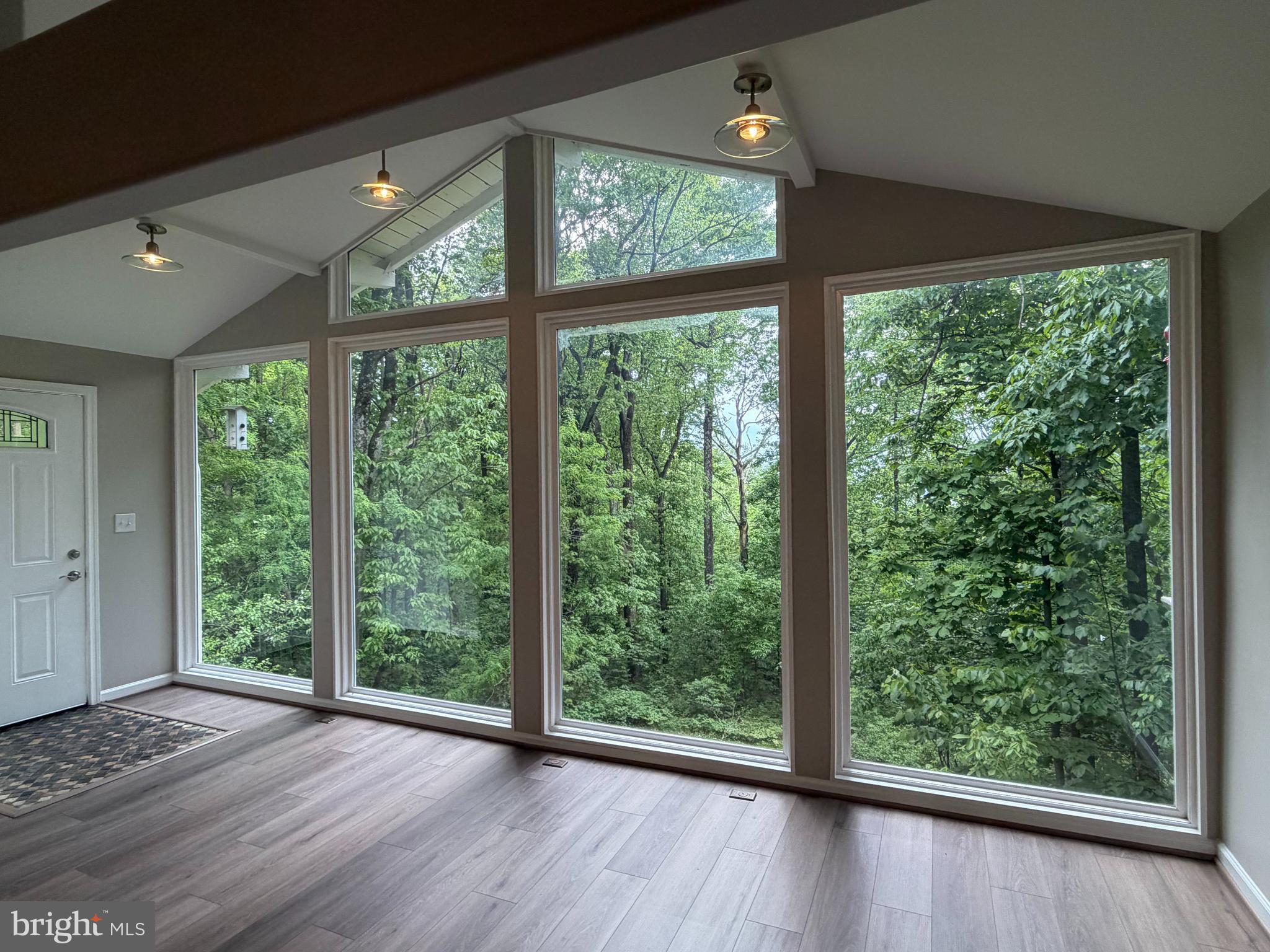 This charming 4-bedroom, 3 full bath home is tucked just off Freezeland Road, nestled among the trees and within walking distance of the Appalachian Trail and access to the G.R. Thompson Wildlife Management Area — outdoor lovers, take note!

Exceptional opportunity for a Mountain retreat, full-time residence, or income-producing investment property with short-term weekly rental potential! 

Freshly painted throughout , this inviting home features brand-new LVP flooring (2026), expansive windows with lush green views, and an abundance of natural light. Recent updates include a new roof (2024), washer & dryer, refrigerator, and stove (2024), offering both style and peace of mind.

Enjoy cozy winters with the high-quality wood-burning stove that helps save on heating costs, propane heat, and the convenience of a tankless hot water heater. Step outside to the large deck where you can hear a pin drop while relaxing with your morning coffee surrounded by nature. The property also features a fire pit and a large auxiliary driveway with VDOT state-maintained road access.

Located in the Blue Mountain community, residents enjoy nearby lake and beach access perfect for fishing, relaxing, or simply soaking in the peaceful mountain setting. 

The sale includes both the .89-acre homesite and the adjoining .79-acre parcel for a combined 1.68 acres of wooded privacy and possibility! ***See Survey in attached Documents***