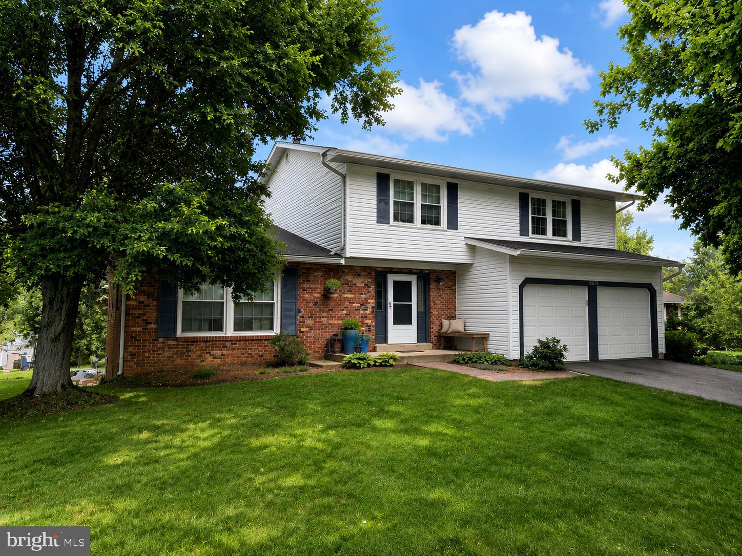 Your Search is Over! Welcome home to this beautifully updated 4-bedroom, 3.5-bath colonial nestled on a quiet cul-de-sac in sought-after Burke Centre. Offering a perfect blend of stylish updates, comfortable living spaces, and an exceptional location, this home is sure to impress.
The main level features gleaming hardwood floors, abundant natural light, and stylish designer finishes throughout. A formal dining room with an elegant chandelier provides the perfect setting for entertaining, while pocket doors lead to a dedicated home office with recessed lighting. The heart of the home is the open kitchen, complete with stainless steel appliances, granite countertops, ample cabinetry, and a breakfast bar. The adjoining family room features a cozy fireplace flanked by custom built-ins and opens seamlessly to the screened porch and impressive Whitmer deck, creating perfect indoor-outdoor living spaces. The private, fenced backyard is highlighted by a custom stone patio and firepit.
Upstairs, the spacious primary suite offers a large closet and beautifully renovated ensuite bath. Three additional generously sized bedrooms, each with walk-in closets, share an updated hall bath.
The finished walkout lower level expands the living space with a large recreation room featuring luxury vinyl plank flooring. A versatile bonus room is perfect for guests, a home gym, hobby room, or second office. A stylish full bath and an envy-worthy laundry room complete this level.
Recent updates include an EV charger, whole-house humidifier, updated interior doors, extensive hardwired networking,  hot water heater (2018,) patio/firepit (2020), roof & insulation (2022), refrigerator (2024), microwave (2025) and carpet (2026).
Enjoy all the amenities Burke Centre is known for including pools, ponds, walking trails, tot lots, community centers, and top-rated schools. Conveniently located near Terra Centre Elementary, Robinson Secondary School, shopping, dining, parks, and major commuter routes.
This exceptional home offers the space, updates, and location you do not want to pass up.