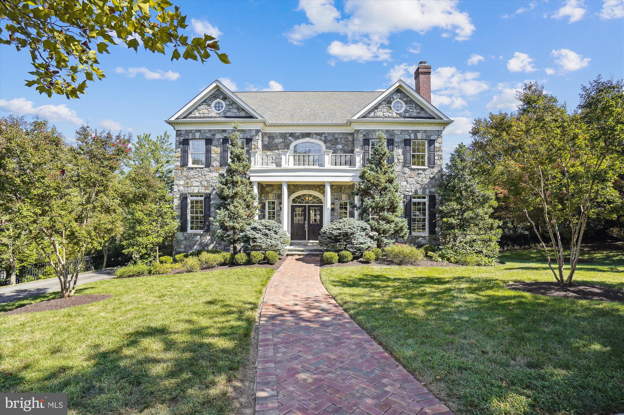 Welcome to 603 President Ford Ln, a stunning Colonial-style home nestled in the heart of historic Alexandria, Virginia. This elegant property boasts timeless architecture, modern amenities, and a location that effortlessly combines urban convenience with suburban tranquility.  With 6 bedrooms, 5.5 bathrooms, and over 7,000 square feet of finished living space on a half-acre lot, this home boasts ample room for family living and entertaining.  Both the main level and second level feature rugged yet elegant distressed Brazilian Hardwood floors.  The chef's kitchen features granite countertops, stainless steel appliances, ample cabinet space, and a convenient island, making it the perfect space for culinary creations and social gatherings.  On a chilly evening, enjoy the ambiance of a cozy gas-log fire from the formal living room, family room, or den.  Step out onto the spacious patio, ideal for outdoor entertaining and relaxation, and perfect for enjoying gorgeous sunrise views with a cup of coffee.  The primary bedroom suite is a true retreat, boasting dual walk-in closets and a spa-like en-suite bathroom with a luxurious soaking tub and a separate shower.  The laundry room is conveniently situated on the second level and includes generous cabinet and counter space.  The basement provides additional living space, wet bar, a full bathroom, and an abundance of storage.  The mudroom includes additional laundry facilities and built-in storage, and provides access to and from the roomy three-car garage.  Enjoy your favorite music throughout the home and on the patio with the Niles Whole-House Audio System.  603 President Ford Ln offers the perfect blend of style, comfort, and convenience. Don't miss the opportunity to make this charming Alexandria home your own. Schedule a showing today and experience the beauty and warmth this property has to offer. It's time to start living the Alexandria lifestyle you've always dreamed of!