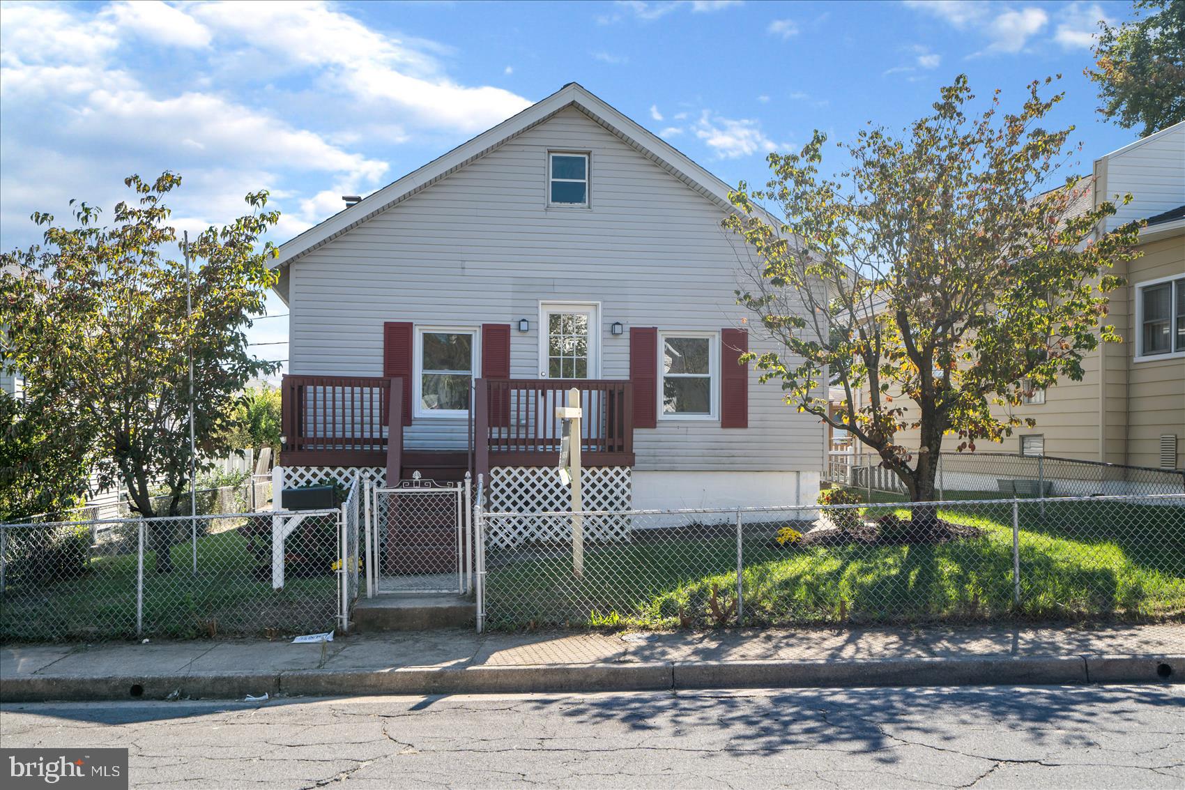 Don't miss this amazing opportunity to own this renovated rancher home in Lorraine Park. Upon entry, you will be welcome with an open floor plan, spacious room sizes, recent floors,  a formal  living room and dining area with arch doorway,  updated kitchen with stainless steel appliances. two bedrooms, and a full bathroom. The exterior showcases a large deck, which is  is great for outdoor fun, and a parking pad.