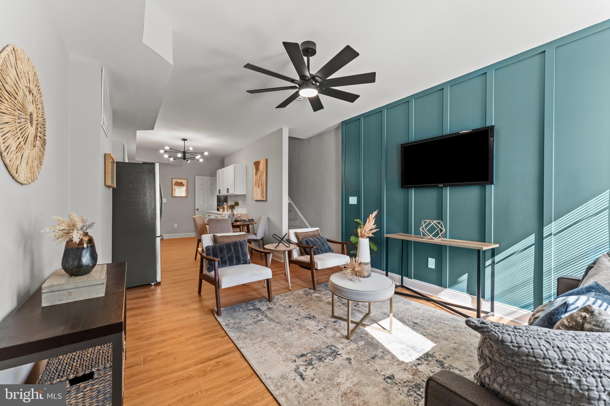Discover the momentum building in Broadway East/Berea with this beautifully renovated home, offered at an exceptional $269,900. Blending modern finishes with warm, welcoming spaces, this residence is perfectly suited for today’s flexible lifestyle.

Step inside to an open-concept living and dining area that flows seamlessly into a stylish contemporary kitchen featuring sleek cabinetry, durable countertops, and stainless steel appliances—ideal for entertaining or everyday living.

The thoughtfully designed layout offers space and versatility across three levels. The ground floor includes a private bedroom perfect for guests, a fitness room, or additional flex space. On the main level, you’ll find another bedroom and a full bath, creating an ideal setup for multigenerational living or convenient guest accommodations.

Upstairs, the second floor features three additional bedrooms and two full baths, including a spacious primary suite with a beautifully tiled shower and designer-inspired finishes. One of the secondary bedrooms would make the perfect home office, creative studio, or nursery, giving you the flexibility to tailor the space to your needs.

Enjoy outdoor living in the enclosed backyard oasis complete with privacy fencing—perfect for relaxing, entertaining, or creating your own garden retreat.

This home also qualifies for FHA financing and Baltimore’s “Vacants to Value” program, making homeownership even more attainable. With nearby renovated homes in 21213 selling at or above this price point, this is an incredible opportunity to own in a neighborhood experiencing exciting revitalization.

Conveniently located just minutes from Johns Hopkins, downtown Baltimore, and major commuter routes, this home offers the perfect combination of style, space, and long-term value. Schedule your private showing today!