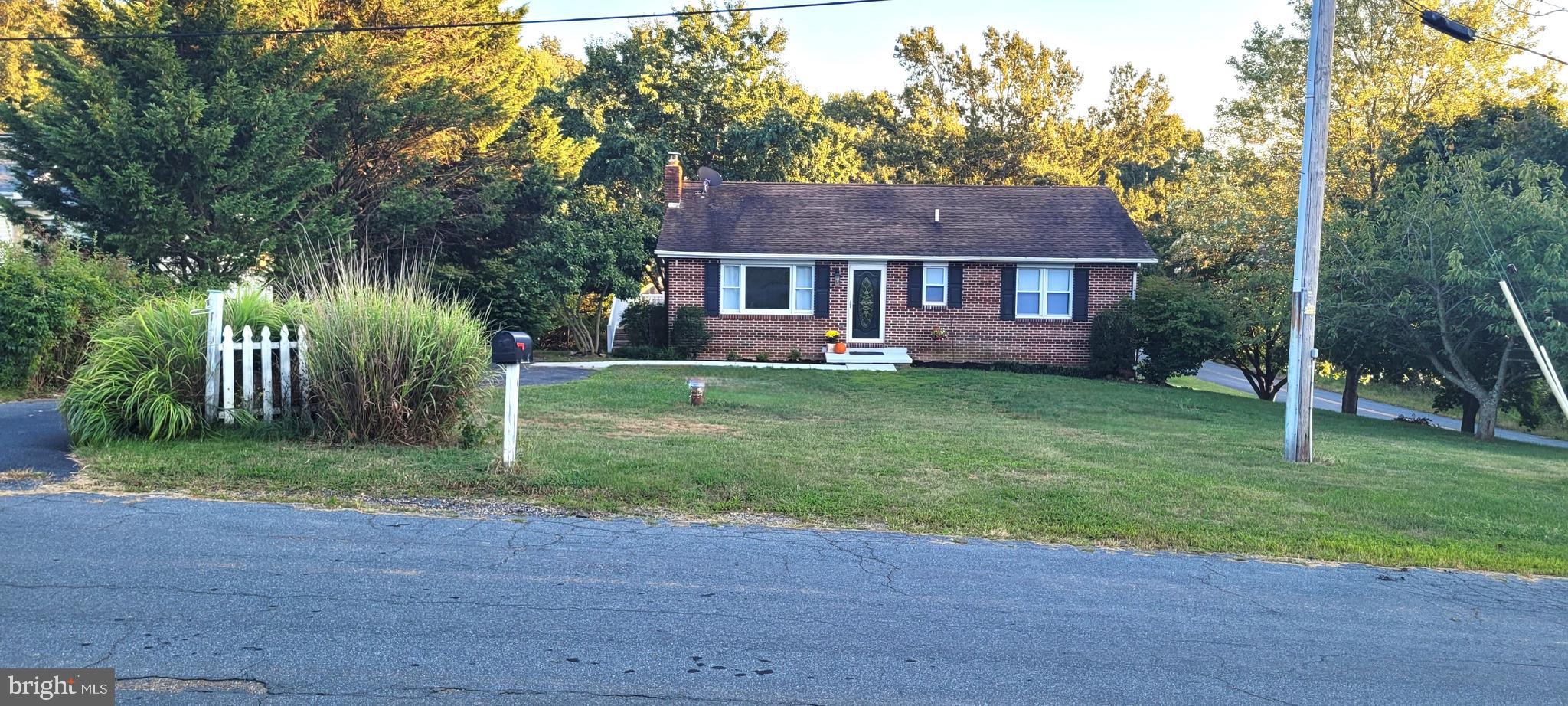 Renovated home in the country ready for new owners! 3 bedroom, 2.5 bath rancher on a corner lot of a cul-de-sac with NO HOA. Open concept kitchen with new stainless appliances, new cabinets and island, as well as granite countertops. New flooring throughout the house, new HVAC, new water heater, and a large back deck for additional outdoor space to entertain. Property includes 2 separate driveways, a single car garage, plus a 2nd building with an oversized 2 car garage and loft. Solar panels on the roof are OWNED and transfer with sale of the house. Plenty of parking for boats, RVs, and other toys! Lot is larger than listed on the public record.