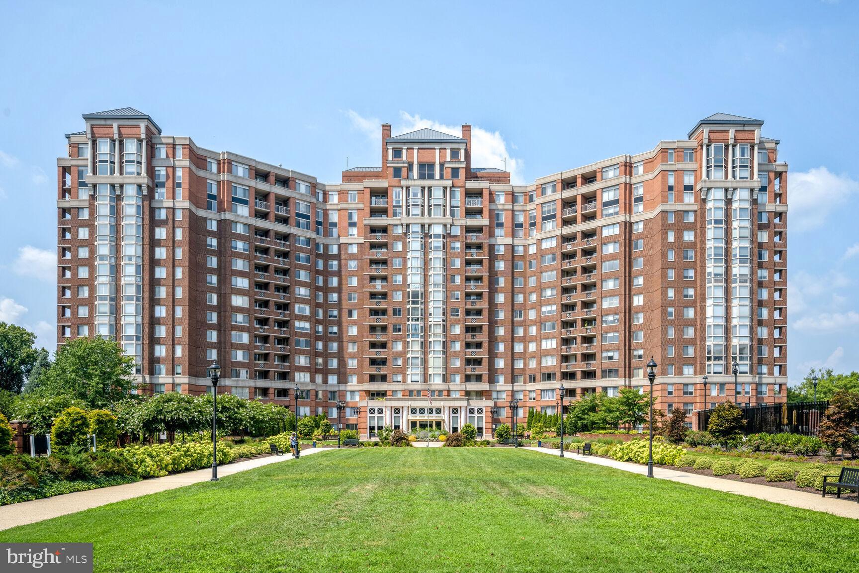 Luxury Updated Penthouse | 2,435 Square Feet | 3 Bedrooms | 3 Deeded Garage Parking Spaces | Storage Unit | 2 Private Balconies.

Experience an extraordinary opportunity to own one of North Bethesda's most exceptional penthouse residences. Encompassing 2,435 square feet, this beautifully updated luxury condominium offers three spacious bedrooms, two full baths, one half bath, two private balconies, and three deeded garage parking spaces—an exceptionally rare offering. Elevated above the city with breathtaking panoramic views and spectacular sunrises, this remarkable home combines sophisticated design, generous living spaces, and resort-style amenities in one of Montgomery County's most desirable communities.

Welcome to 5809 Nicholson Lane #1504, where soaring ceilings, expansive walls of glass, and abundant natural light create an elegant and inviting atmosphere. Two private balconies seamlessly extend the living space outdoors, offering the perfect setting for morning coffee, evening entertaining, or simply enjoying sweeping views.

Designed for both grand entertaining and comfortable everyday living, this exceptional residence features a thoughtfully designed floor plan with spacious formal and casual living areas. The gourmet kitchen showcases fully integrated appliances concealed behind custom hardwood cabinetry, creating a sleek architectural aesthetic. Extensive cabinetry provides exceptional storage and pantry space, while granite countertops, generous work surfaces, and a charming breakfast nook make the kitchen as functional as it is beautiful.

The formal dining room flows effortlessly into the expansive living room, anchored by a fireplace and dramatic floor-to-ceiling sliding glass doors leading to the balconies. The luxurious primary suite serves as a private retreat, featuring a beautifully updated spa-inspired bath with an oversized tile walk-in shower, granite double vanity, dressing area, and abundant closet space. Two additional bedrooms offer exceptional flexibility for family, guests, executive home offices, or a private library. Then second bedroom features custom built-in bookcases and tranquil courtyard views, while the third bedroom includes a walk-in closet, built-in shelving, and its own full bath.

Additional highlights include an updated powder room, private storage closets, in-unit washer and dryer, and three deeded garage parking spaces—a truly rare and valuable feature that provides unmatched convenience for multiple vehicles and guests.

Residents of The Wisconsin Condominium enjoy an outstanding collection of resort-style amenities, including 24-hour gated security, concierge service, indoor and outdoor swimming pools, a state-of-the-art fitness center, tennis, pickleball and racquetball courts, sauna, party and community rooms, beautifully landscaped grounds, and secure elevator access.

Perfectly positioned in the heart of vibrant North Bethesda, this premier address is one block from North Bethesda Metro and just minutes from Pike & Rose, Whole Foods, Trader Joe's, Harris Teeter, Target, Congressional Plaza, Montrose Crossing, Wildwood Shopping Center, the Capital Crescent Trail, acclaimed restaurants, boutique shopping, fitness studios, the iPic Theater, and major commuter routes to Bethesda, Washington, D.C., and Northern Virginia.

The condominium fee includes water, cable television, common area maintenance, parking, and access to the community's exceptional amenities, providing remarkable value and a truly effortless lock-and-leave lifestyle.

Rarely does a penthouse combine 2,435 square feet, three bedrooms, two private balconies, three deeded garage parking spaces, panoramic views, luxurious finishes, and an unrivaled North Bethesda location. This is an exceptional opportunity to own one of the area's finest luxury residences.