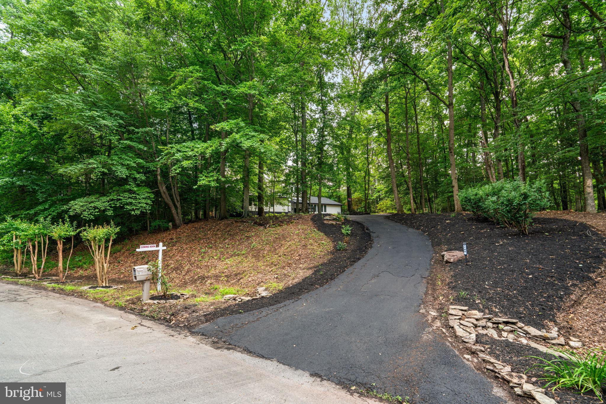 This is the one you have been waiting for! Totally new and renovated from top to bottom this contemporary four levelshouse is your private daily getaway from all the daily hustle and bustle. Located on over two wooded acres but only a few minutes from Annapolis and the Chesapeake Bay,  short distance to either Baltimore or DC, it is strategically located. The master bedroom on the main level also features a loft perfect for a home office or studyand accessible only by a spiral staircase. The master bathroom is striking with a soaking tub and a large walk- in shower. The centerpiece of this home is the new large kitchen with a beautiful island overlooking the gorgeous family room with recessed lights and 13 skylights! The new rear deck is one of a kind,  just the overall size will be a pleasant surprise, a great place to chill out and enjoy nature or just hang out with friends and neighbors.