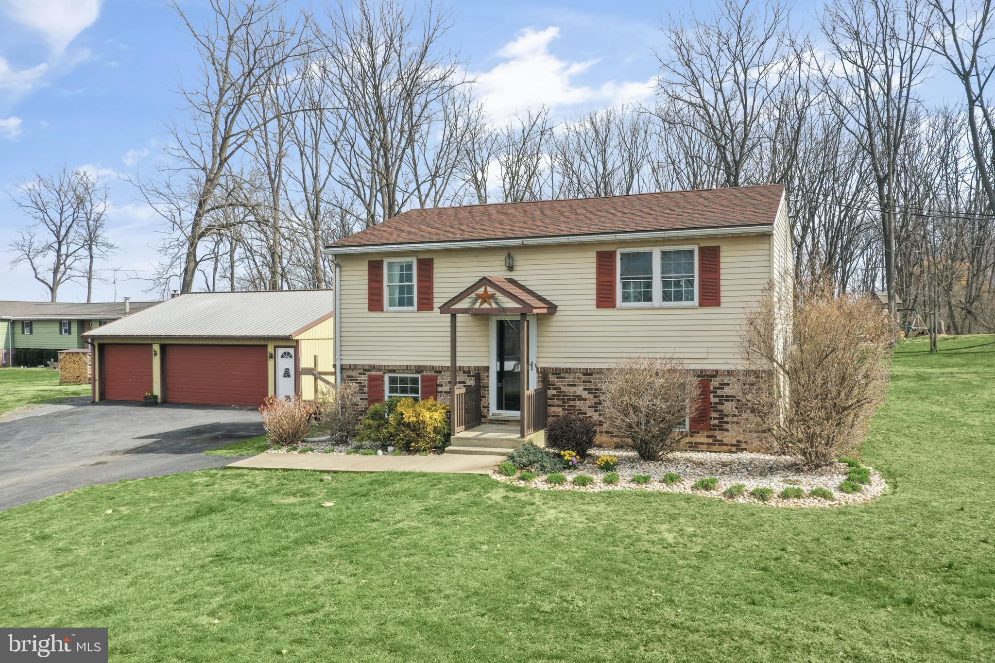 Welcome to 164 Evansville Rd, a property that offers space, versatility, and endless possibilities. Situated on nearly two acres, there’s plenty of room for outdoor activities, gardening, or even keeping animals with its agricultural zoning. A large 3-car garage with extra workshop space  and 200-amp electric service is perfect for car enthusiasts or hobbyists. Inside, the foyer leads to a bright living room with a bay window that fills the space with natural light. The kitchen features granite countertops and flows into the dining area. This level also includes a bedroom, a full bath, and a bonus room with access to an oversized deck, perfect for unwinding in a peaceful setting. The lower level offers three bedrooms, a laundry area, and a half bath. Don’t miss your chance to own this incredible property!