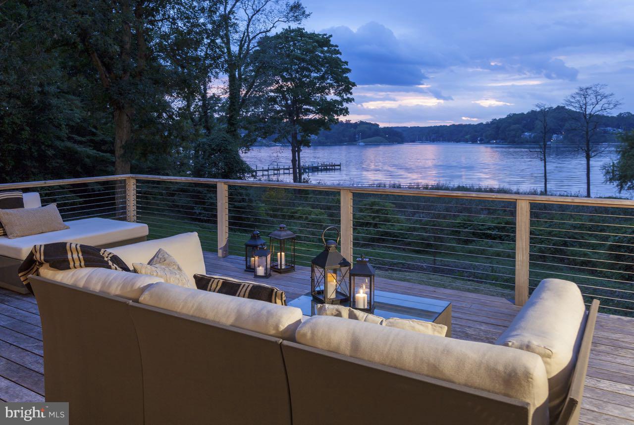Serious reduction for an amazing property  and a  one of  kind value in the current market .Outstanding Severn River Waterfront on 4 private acres just minutes from Downtown Annapolis. Sweeping views of the Severn River from this wonderfully renovated 5 bedroom, 4.5 bath home. The Light filled open floor plan offers first floor living and boundless entertaining spaces. 325' of water front footage, private pier, 2 power boat lifts & 20' x 40' pool permit in hand. 3 car Garage..Mins to Bay