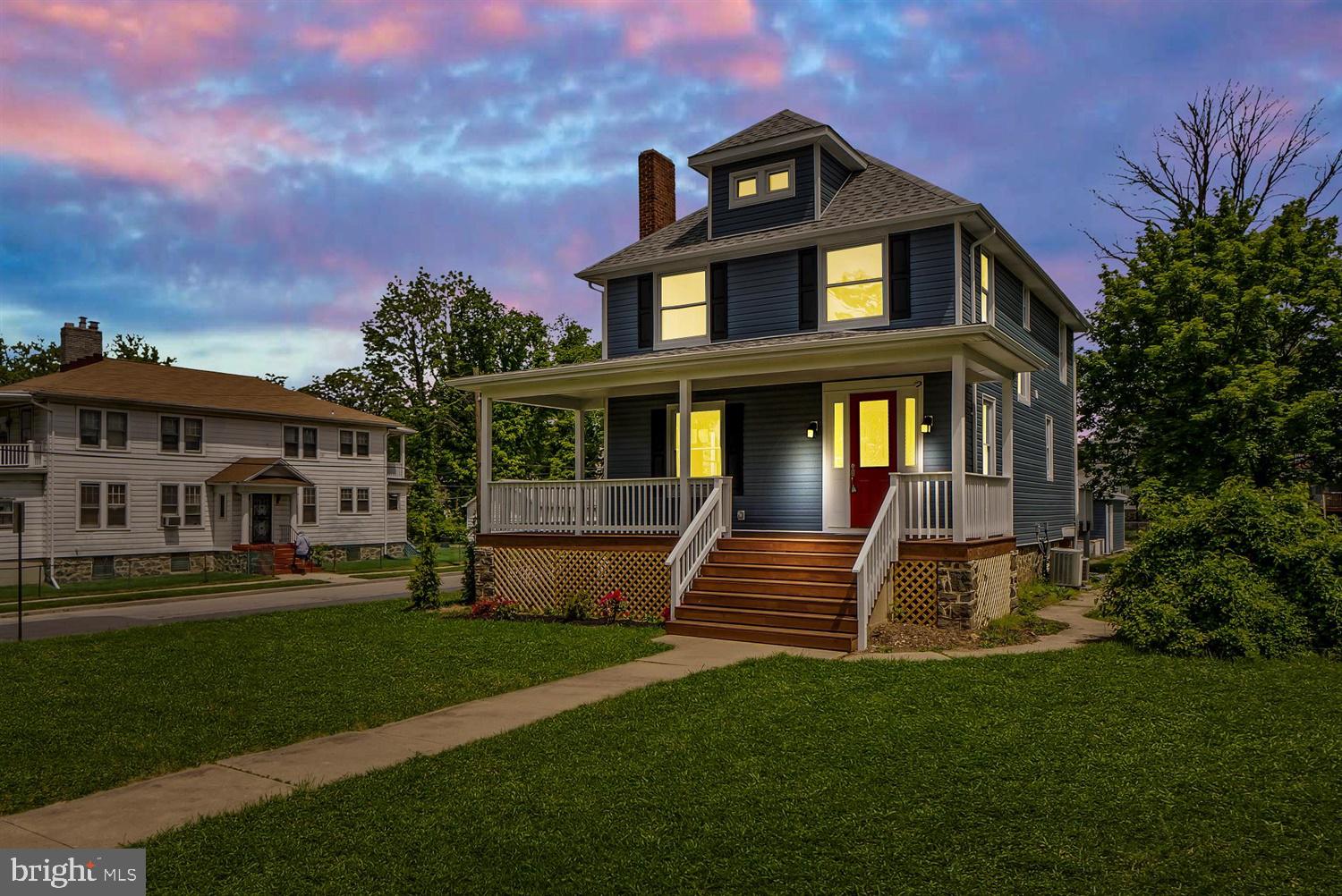WOW.  What a find in the sought after area of Howard Park/Forest Park.  Completely and BEAUTIFULLY  renovated  Huge, 5 bedroom 4 full bath  Porch front Home on large corner lot.  Grand  wood floor entrance leads you to an open floor plan with living room featuring  marble mantel gas fireplace adjoining your brand new kitchen and dining room.  Granite counters highlight your large  kitchen Island with seating for your family.  Stainless steel appliances and plenty of cabinets for all your cooking  and entertaining needs.  High end finishes abound in this home.  First floor Master Suite with exquisitely  designed ceramic tile bath.  Second floor features a second Master Suite with  large attached  bath and plenty of closet space.  2nd floor laundry room and 2 additional bedrooms and full bath.  Venture to the 3rd floor  for what could be your 5th bedroom or a large office space.    Partially finished basement with another full bath.  A large deck overlooks your massive backyard and leads to a 2 car detached garage.  Central air through-out with 2 zone heating and cooling featuring Trane HVAC.    You will not find a  nicer, bigger renovated home in the area for this price. This home is designed for entertaining family and friends and making memories.  It will not last long.   Now for the icing on the cake - $5,000 seller contribution for the buyer's settlement costs with a full price offer.  Once again - WOW!   Take a Virtual Tour of this wonderful home by clicking on the Virtual Tour button.  Come and visit and you will call it home.