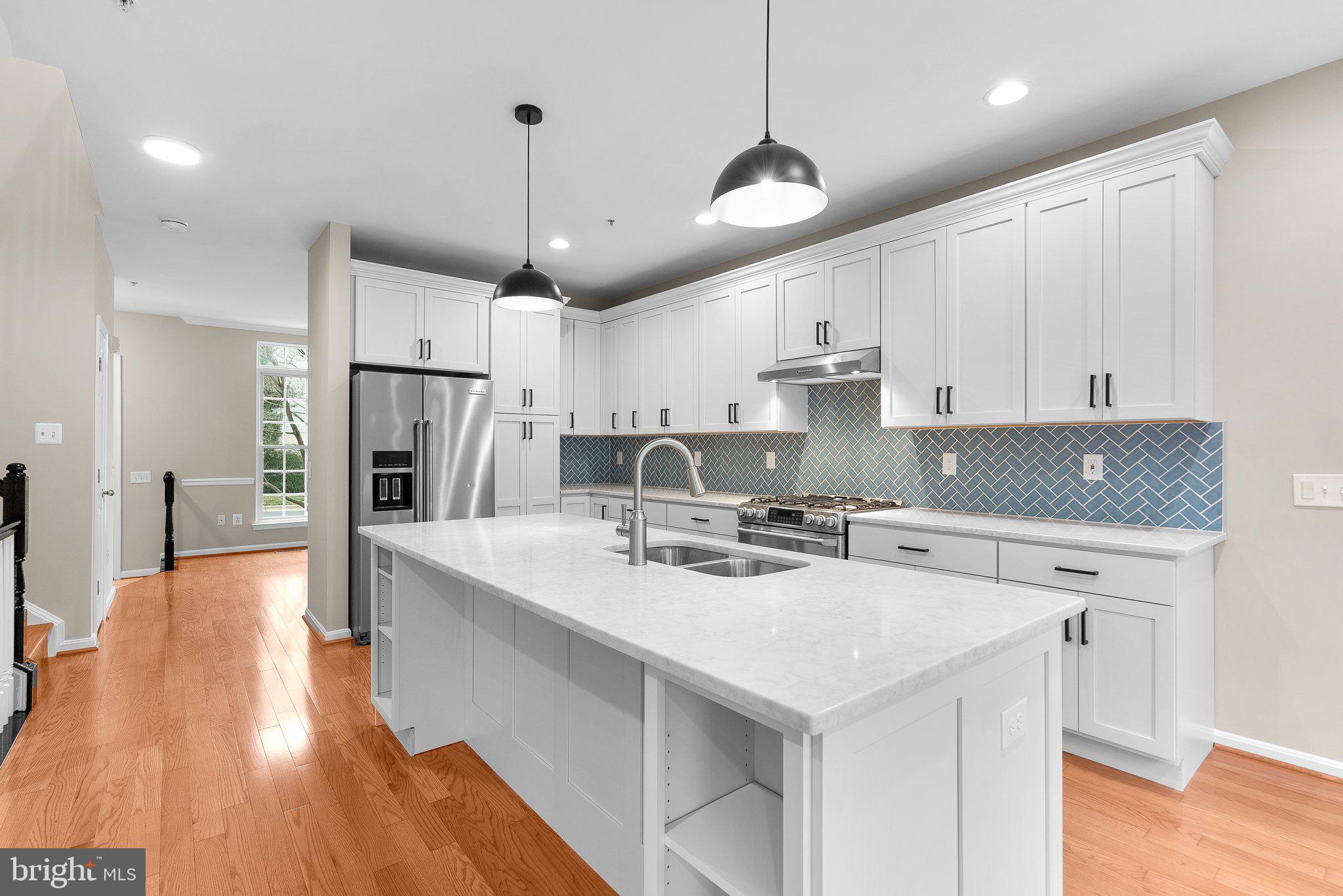 Welcome to your dream home at 13213 Lake Geneva Way, a stunning townhouse nestled in the serene Fountain Hills community of Germantown, MD. This captivating residence boasts three spacious bedrooms on the upper level, with an additional potential fourth bedroom in the walkout basement, perfect for guests or a home office.

Indulge in luxury with 3.5 elegantly updated bathrooms, ensuring comfort and style for family and guests alike. The heart of this home is its modern, open-concept kitchen, featuring a vast island that serves as a culinary hub for entertaining and family gatherings.

The master suite is a haven of tranquility, complete with an updated bathroom that offers a spa-like experience. The bedroom-level hall bathroom has also been thoughtfully renovated, adding a touch of sophistication.

Step outside to the large deck and immerse yourself in the peaceful ambiance of the wooded views, an ideal backdrop for morning coffees or evening relaxation. This home combines modern living with natural beauty, creating a perfect balance for a comfortable and stylish lifestyle.

Don't miss the opportunity to make 13213 Lake Geneva Way your new home – a place where memories are waiting to be made.