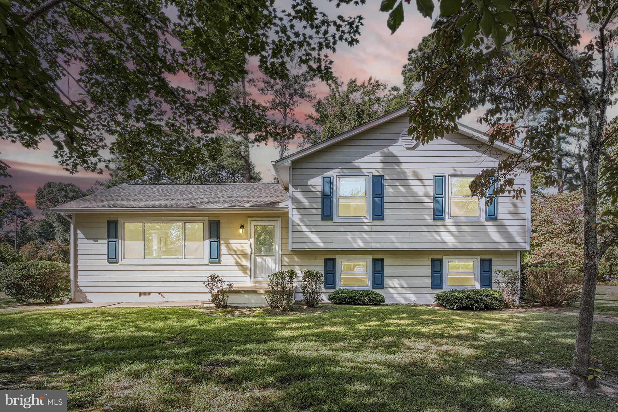 Discover the perfect blend of coastal charm and modern luxury in historic Westmoreland County. Sited on a premium, HOA-free double corner lot with stunning water views, this home offers full access to community beaches, boat ramps, and pools for a modest annual county recreational fee. 

Completely refreshed in 2025, the interior features an open-concept main level with waterproof LVP flooring, a chef's kitchen with brand-new stainless steel appliances, and a dining room leading to a new back deck. 

The upper level hosts three peaceful bedrooms and a renovated full bath, while the versatile lower level includes a cozy fireplace den, office, laundry suite, and updated half-bath. Car enthusiasts and hobbyists will love the oversized 30’ x 26’ detached Hardiplank garage with 10-foot doors and a dual-driveway setup. 

Offering total peace of mind, nearly every major component is brand new or recently updated, including the roofs, windows, and water heater. Schedule your private showing today!