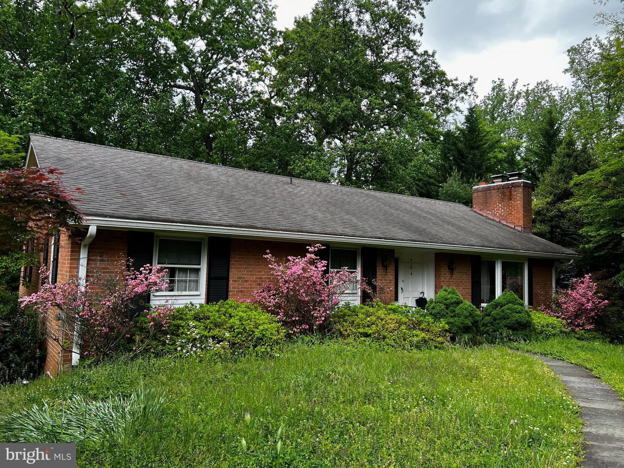 This is a rare opportunity to own a prime .5077 acre Home/Lot in McLean, just off Old Georgetown Pike and one street away from Langley High School.  Property has an existing two level brick house that can be renovated, popped or removed to build your dream home.  Existing 3 Bedroom, 3 Full Bath single level Ranch Style (full-brick) house is in good structural condition with a recent new roof, recent H2O Heater, Recent Furnace / AC unit.  This property is a dream come true for someone looking for a 2000 square foot same level home with huge potential.  House has an unfinished walk up storage attic and a walkout basement of 2000+ Sq Ft.  This property is being sold “As-Is”.  All appliances, including recent new cloths washer and dryer are operational.  Public water & sewer.  There is a short asphalt driveway at the property entrance leading to the 1 stall rear entry, lower level garage.  Bring your builder, architect or contractor to determine your perfect house design to best enjoy the woods and views.  Schedule a showing and come take a look at what may be your diamond in the rough. Walk the property.  Plenty of room for relaxing activities for those who love the outdoors.  Mackall Ave is a quiet, non-thru street with No HOA. Located only seconds from Old Georgetown Pike and minutes to the I-495 Beltway entrance.