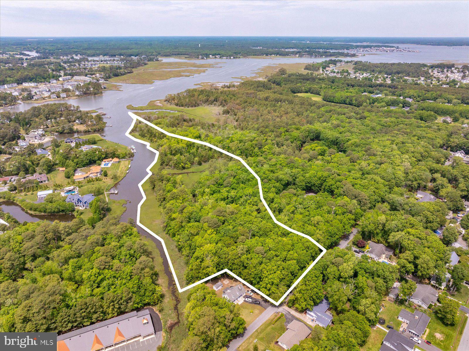 The best of both worlds! Don't miss this rare opportunity to get a truly unique waterfront property in West Ocean City. Over 15 acres on a quiet street, but just a short drive from dining, beaches, and nightlife! This property has an EDU, so you can build your home without worrying about perc tests or septic systems. With a huge coastline and dense woods there's so much potential in this property! Enjoy the serenity of nature while being close to all the amenities that West Ocean City has to offer!