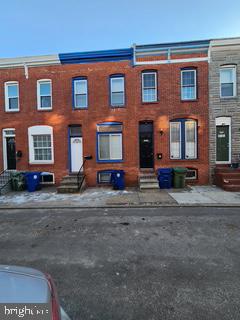 Welcome to the Baltimore Highlands! This house is an investors dream! The open-concept main level features a living room, dining area, and eat-in kitchen, all accented by classic exposed brick walls! The upper level has 2 generously-sized bedrooms (with closets!) and an updated bathroom with ceramic tiling. The lower level has a second updated bathroom and an additional large bedroom that is flooded with natural light. A spacious laundry room with a convenient utility sink is situated at the back of the basement. The private patio in the fenced rear yard is the perfect spot for grilling. This house is conveniently located within walking distance to the famous 137-acre Patterson Park, where residents can enjoy green space, jogging paths, an ice skating rink, public swimming pool, duck pond, playgrounds, soccer fields, and more! A few short blocks south is The Creative Alliance, a vibrant arts center with over 200 events a year ranging from costume dance parties, to folk music performances, rap, world music, and indie film screenings. The trendy neighborhoods of Canton and Fells Point are mere minutes away, and offer an array of dining, shopping, and entertainment options.