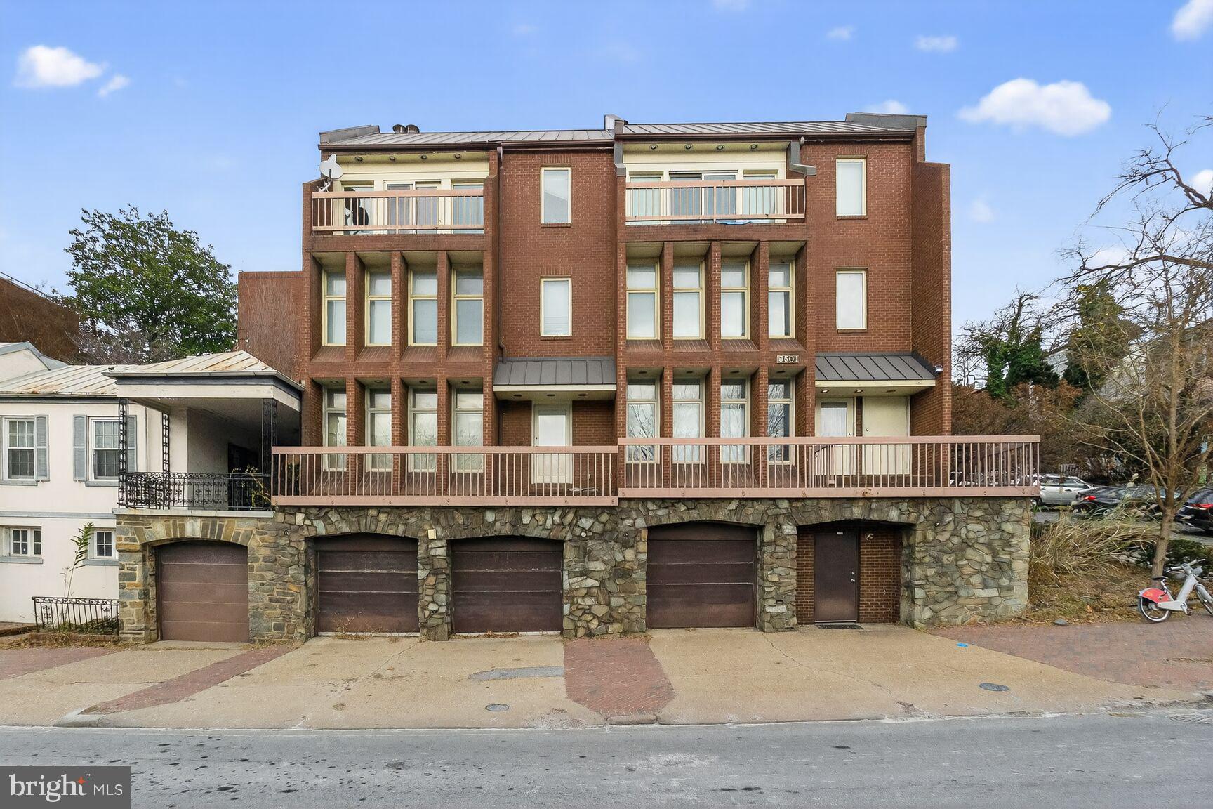 Comprising approximately 5,100 square feet including four garage parking bays, this building offers an excellent development opportunity.  Currently used as offices, the space could be reimagined as condominiums, townhouses, or as an important single-family house.  The location is incomparable.  With views of the Key Bridge, the Potomac River, and Arlington, there are few spaces that rival this one for scenic vistas. The building could also serve as offices for a small firm accommodating up to 20 on-site employees.  With a small investment of resources, effort, and imagination, the interior spaces could be reworked to function as they currently do, albeit with an improved demeanor.  There is also enough private garden space to function as an additional work area in good weather, or to enjoy on its own.