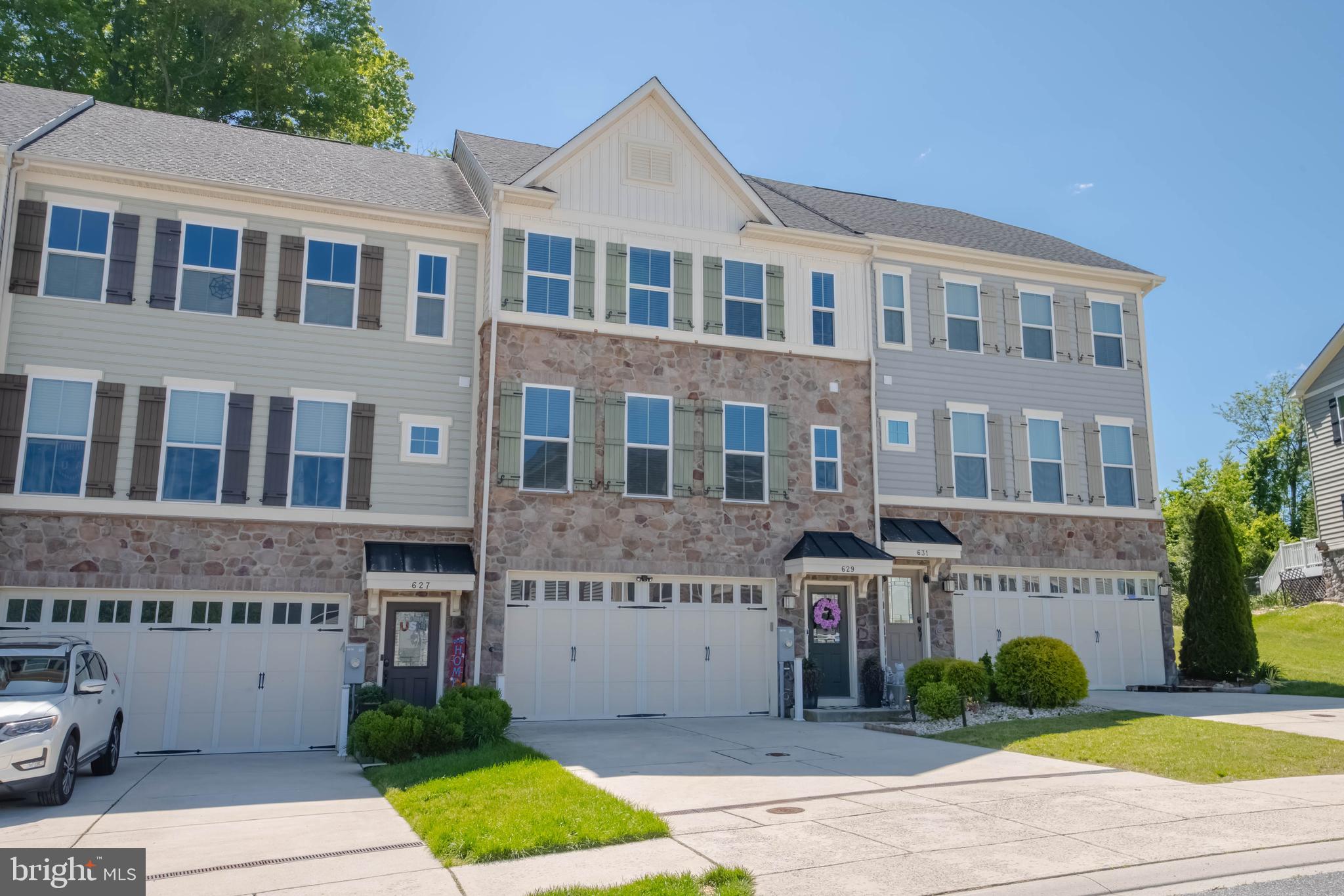 Built in 2016 in the sought-after Magness Mill community, this 3 bedroom, 2 full bathroom, 2 half bathroom home offers a 2-car garage, finished basement, smart home upgrades, and thoughtful updates throughout. The kitchen features a breakfast bar and pantry for extra storage, while the spacious primary suite includes barn doors leading to 2 walk-in closets with automatic closet lighting and a large private bathroom with soaking tub and stand-up shower.  The finished basement provides flexible living space for a recreation room, guest area, or possible additional bedroom. Additional features include a Ring system with front and rear cameras and window alarms, smart home (Alexa) light switches throughout, wired-in window candles, recessed lighting, great natural light, an upgraded back deck with a remote-controlled retractable awning that covers the entire deck, newly installed privacy fence in the back yard, and an EV charging outlet in the garage. Recent updates include painted rooms, accent walls, tint on the front windows, gutter guards in 2022, newer appliances such as - washer and dryer in 2020, microwave in 2024, and refrigerator in 2025. Roof, HVAC, water heater, and dishwasher are from 2016. A beautifully maintained home with modern convenience, flexible living space, and standout upgrades in one of Bel Air’s desirable communities.