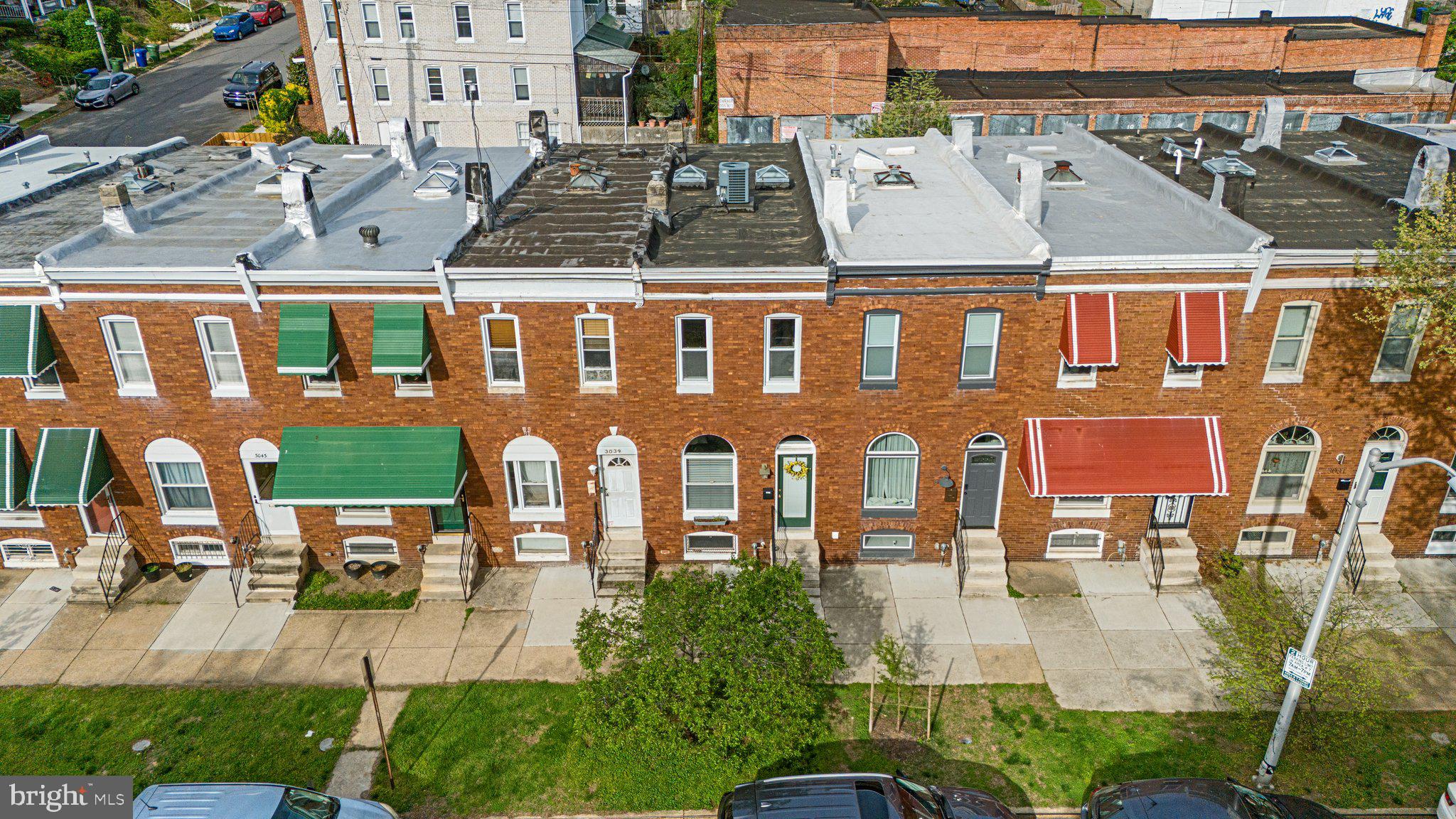 3037 Huntingdon Avenue offers the perfect blend of historic character and modern updates in the heart of Baltimore’s Remington Historic District. This classic two-bedroom, one-and-a-half-bath row home is nestled in a community known for its welcoming spirit, unique architecture, and ongoing revitalization.

Step inside to a bright, freshly painted living and dining area featuring original hardwood floors that flow throughout the main level. The open layout makes the space feel inviting and comfortable, ideal for relaxing or gathering with friends. The convenient half bathroom on the first floor has been recently refreshed.

The kitchen is equipped with stainless appliances, including a new dishwasher (2024), and an office area with direct access to the fenced backyard. Whether you’re enjoying a quiet morning coffee or hosting a casual meal, this space is both functional and welcoming.

Upstairs, you’ll find two spacious bedrooms, each freshly painted and featuring hardwood floors. The remodeled full bathroom (2025) offers a tub/shower combination and stylish finishes, providing a comfortable retreat at the end of the day.

Recent updates include a main drain line replacement (2018), ensuring peace of mind for years to come. The freshly painted interior (2025) and updated bathrooms add to the move-in-ready appeal.

Enjoy the outdoors in your private, fenced backyard—perfect for gardening, relaxing, or entertaining. Across the street, Remington Playground and Stone Run Trail offer green space and recreation right at your doorstep.

Living in Remington means being part of a vibrant, tight-knit neighborhood with a rich history rooted in Baltimore’s industrial past. The area features a mix of historic rowhouses and newer developments, colorful murals, and community gardens. You’ll be just minutes from Johns Hopkins University, the shops and restaurants of Hampden, and some of Baltimore’s best museums and attractions. Many of Baltimore's most popular restaurants are within a mile of this home (R.House, Doppio Pasticceria, Clavel), while Station North and Charles Theater are just a short drive away.

3037 Huntingdon Ave. is more than just a house; it’s an opportunity to be part of a dynamic community with a unique sense of place. Don’t miss your chance to make this inviting Remington rowhome your own.