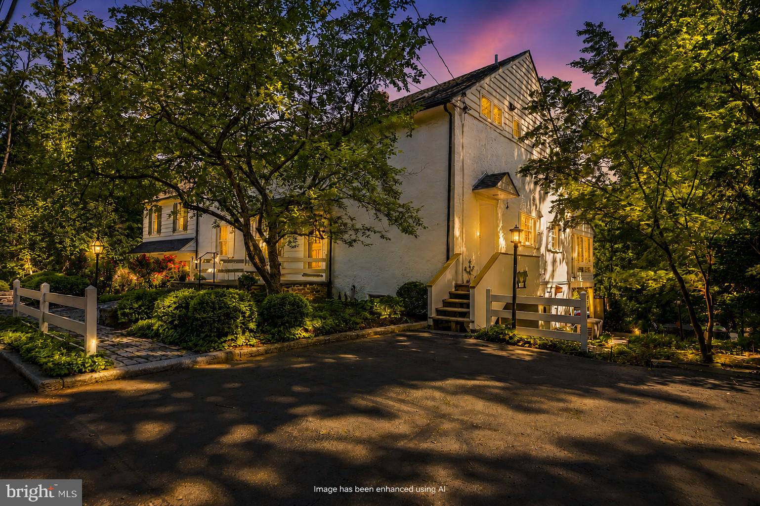A scenic drive leads to Forebay, a one-of-a-kind converted stone barn surrounded by more than 10 private acres in Buckingham Township's Spring Valley Historic District. Here, mornings begin with coffee overlooking Watson Creek, afternoons are spent wandering garden paths and relaxing beneath mature trees, and evenings gather friends around the covered patio, summer kitchen, and hot tub beneath a canopy of landscape lighting.

Originally built circa 1805 and thoughtfully converted into a residence, the home combines authentic Bucks County character with the comforts buyers expect today. Soaring ceilings, exposed chestnut beams, stone walls, skylights, and walls of glass create spaces that feel both dramatic and welcoming.

Designed for entertaining and multigenerational living alike, the home offers expansive gathering areas, private guest accommodations, and seamless connections between indoor and outdoor spaces. A whole-house generator, seven-zone heating system and updated infrastructure provide peace of mind whether the property serves as a full-time residence or a country retreat.

Located just minutes from the restaurants, galleries, boutiques, and cultural attractions of New Hope and Doylestown, Forebay offers the Bucks County lifestyle that continues to attract discerning buyers from New York, New Jersey, Philadelphia, and beyond.