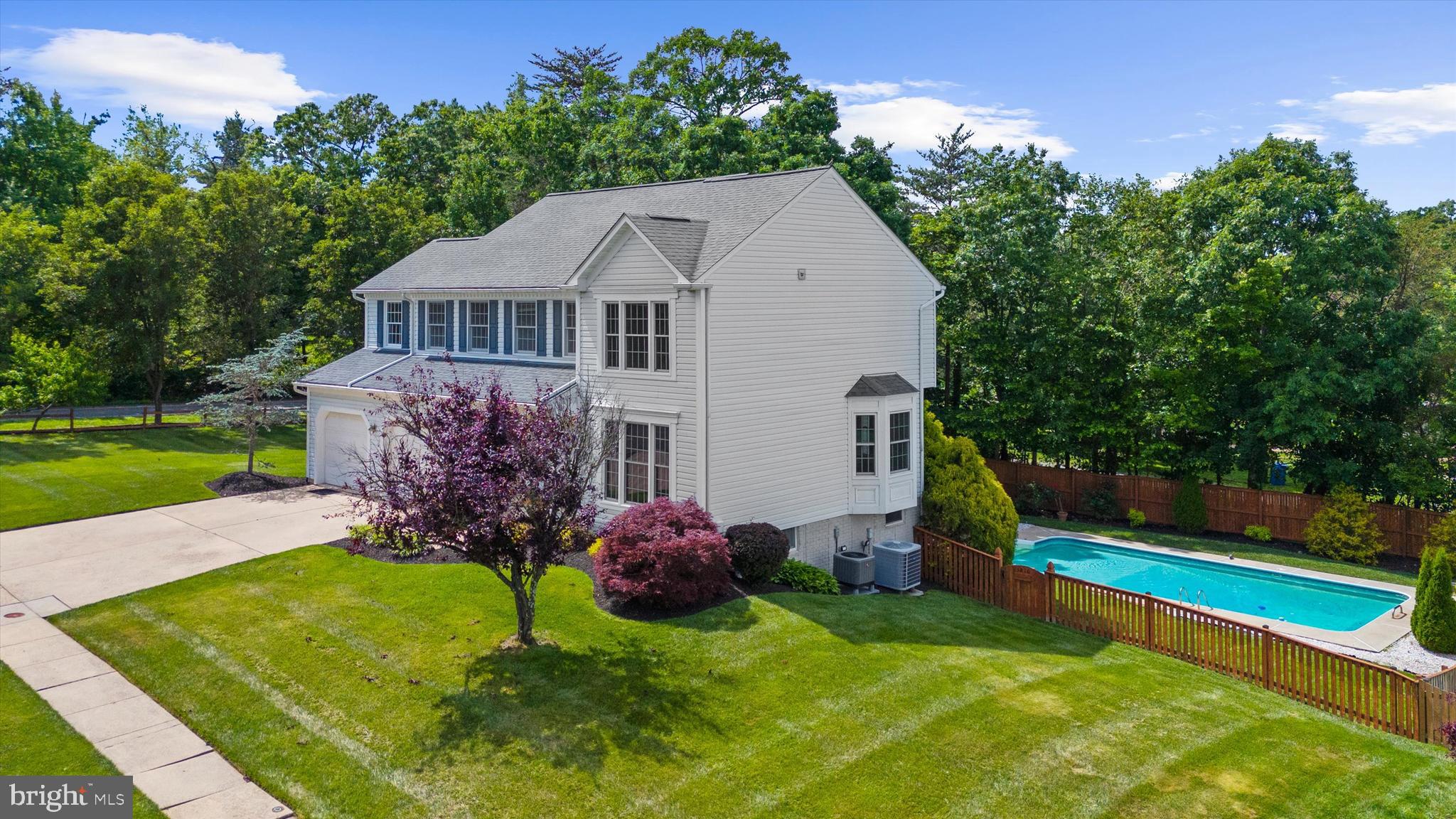 Nestled on a stunning corner lot, this exceptional Colonial offers perfect blend of space, comfort, and modern upgrades, timeless elegance, and resort-style outdoor living with a sparkling in-ground pool. Boasting 5 generously sized bedrooms, 3.5 bathrooms, and two versatile bonus rooms, this beautifully upgraded home provides the perfect balance of luxury and functionality.
From the moment you arrive, you'll appreciate the impressive curb appeal and inviting presence. Inside, curated upgrades and elegant touches elevate every space, creating a warm yet sophisticated atmosphere. The expansive floor plan is ideal for both everyday living and entertaining, featuring spacious gathering areas, abundant natural light, and flexible rooms that can easily serve as a home office, fitness studio, media room, or guest retreat.
The heart of the home flows effortlessly to your private backyard. Step outside and experience true outdoor living with a sparkling in-ground pool and plenty of room to relax, entertain, and create lasting memories. Whether hosting summer gatherings or enjoying a quiet evening under the stars, this backyard is designed to impress.
Retreat to the luxurious primary suite, while family and guests enjoy the comfort of four additional bedrooms and beautifully appointed baths. Every detail of this home reflects pride and meticulous care.
Rarely does a home combine this level of space, flexibility, and outdoor enjoyment in such a desirable setting. This is more than a home—it's a lifestyle.