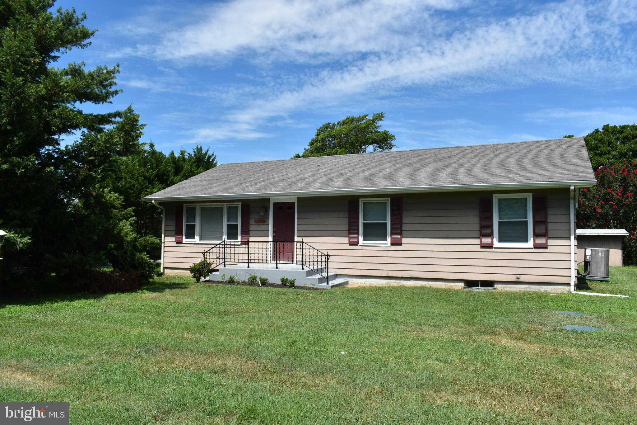 This ranch home is quietly nestled off of Plantations Rd. and is perfectly situated between Historic Lewes and Rehoboth Beach.  If work takes you westbound, Rte 24 is just around the corner.  This home offers single level living with 3 bedrooms and 2 full baths. There's a large deck off the rear of the home for entertaining and dining under the stars.  Freshly painted with newly installed LVP flooring.  The house is on well and septic.