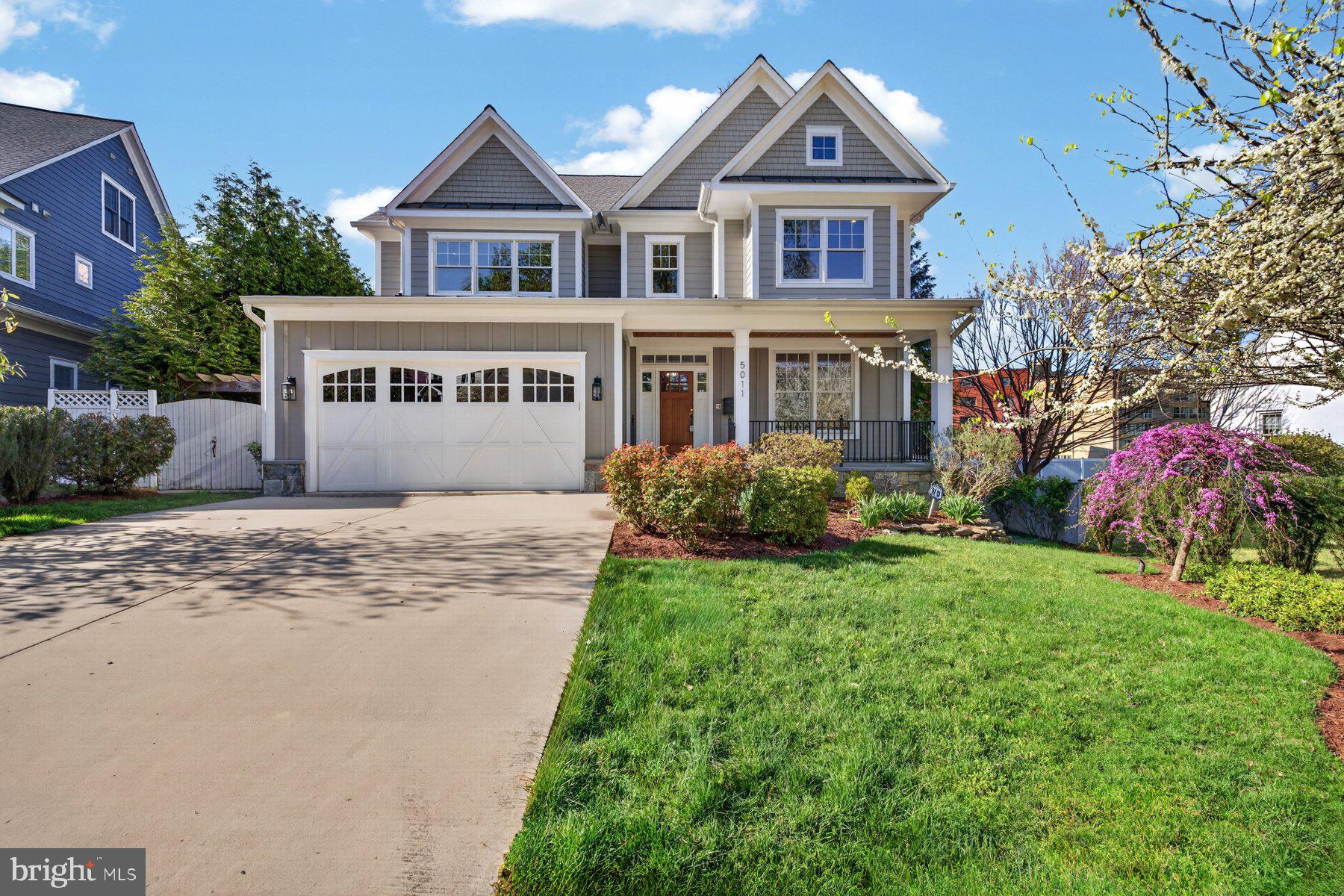 **OPEN HOUSES THIS WEEKEND: SATURDAY, JUNE 6 from 3-5PM AND SUNDAY, JUNE 7 from  2-4PM.** Are you longing to live the city life while living in a beautiful, spacious house? Here is your opportunity...5011 Rugby Ave is a four level stunner with over 6,200 square feet of livable space. Neutral paint, beautiful custom millwork, tray ceilings, built-ins, and custom touches throughout the house make this one-of-a-kind. The current owners did over $450,000 in improvements to include adding a custom covered deck, an elevator that serves all four floors, basement renovation to include full kitchen, two bedrooms, full bath, and family room with gas fireplace, refinished hardwoods, and painted the whole house. The main floor offers an inviting foyer, living room, dining room, chef's kitchen with generous island and stainless steel Thermador Professional appliances, including a six-burner gas range with griddle and double oven. Adjacent to the kitchen is a family room with gas fireplace and entry to the deck. An office, powder room, mudroom, and entry from the 2-car garage round out the main floor. There are beautiful inlaid hardwoods throughout the main level as well as access to the elevator. Upstairs, you will find four of the six bedrooms. The spacious primary bedroom has custom built-ins, two separate walk-in closets and ensuite bathroom with double vanities, a soaking tub, separate shower, and linen closet. There are two bedrooms that share a Jack and Jill bathroom. An additional bedroom as well as a full bath in the hallway and a spacious laundry room with utility sink and ample counterspace round out this level. The top floor has three rooms with custom built ins ready to display your collection from records to books to collectibles. These rooms are versatile and could also be used as office, study, library, or playroom spaces. Another full bath can be found on this floor. The basement offers two bedrooms, a full bath, a full kitchen, living area with gas fireplace, storage, hookups for washer/dryer and walkout to backyard. This level could provide a possibility for multi-generational living.  Radon mitigation system, indoor sprinkler system, and alarm system in place. Located in the heart of Bethesda, just off of Woodmont  Ave and in close proximity to downtown Bethesda for shopping and restaurants. Less than one mile to NIH, Walter Reed, and Bethesda Metro with easy  access to DC for work or sight-seeing. Around the corner is a playground and the start to the Bethesda Trolley Trail with 4.5 miles of trails for walking or biking. This is a fabulous property in a desired location.