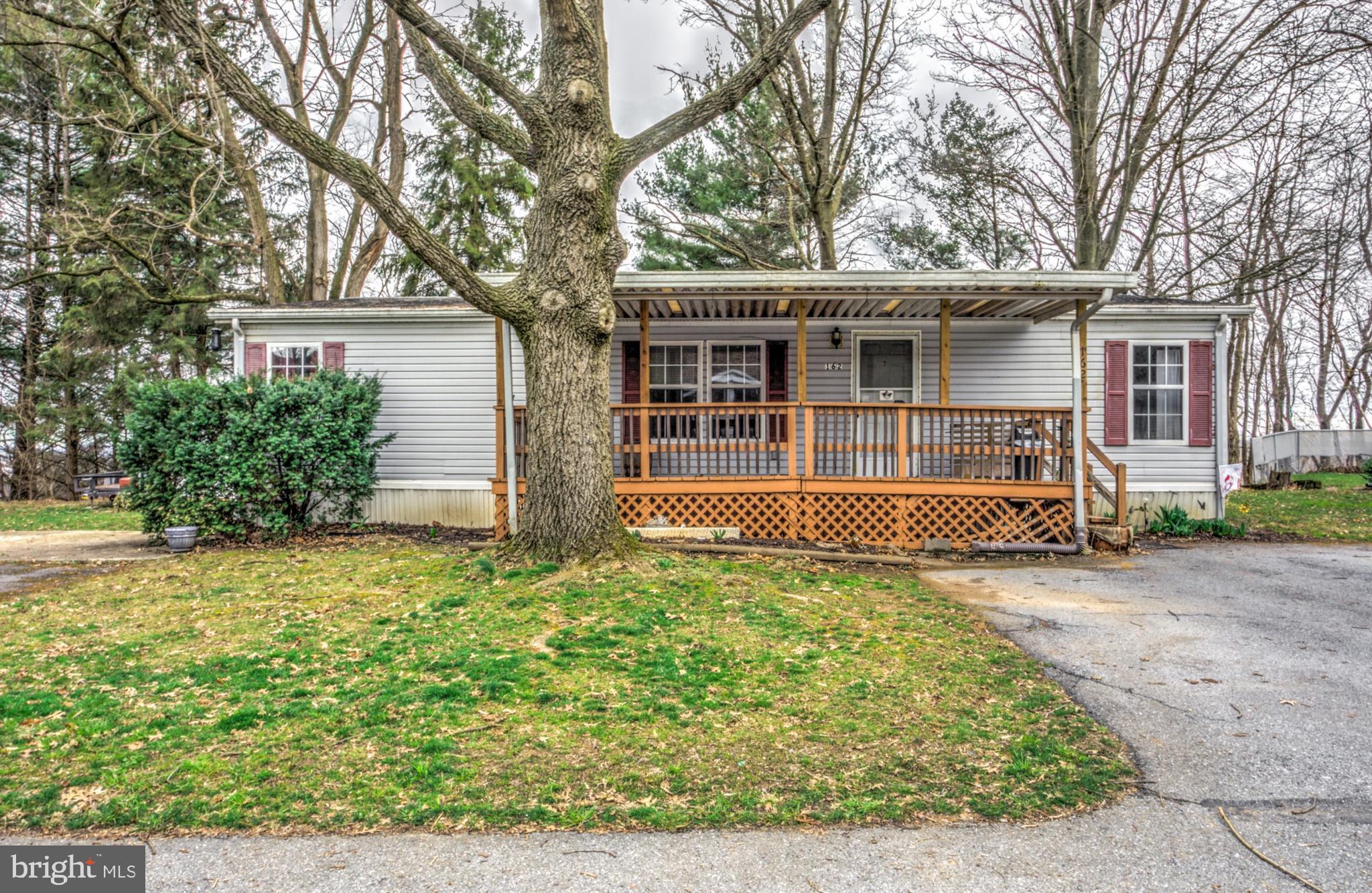 Come take a look at this spacious 3 bedroom, 2 full bath Liberty manufactured home in the Overlook Estates Community.  Hallway bath has a newly installed West Shore walk-in shower.  Additional space to relax on the front porch or private rear deck with lots of room for entertaining.  With a large lot, the riding mower is included for grass cutting and Fall leaf clean-up. Have several cars in your possession?  You will love this lot as you are able to park 4 cars.  A 10' X 12' shed/workshop with electric is great place for your tools.  Some tools will be included in your purchase. Low lot rent of $460/month includes sewer, trash and snow removal of the private road. Buyer(s) must be approved by park management.  Rental of unit is prohibited. Seller just had unit power washed.  Quick settlement is possible.