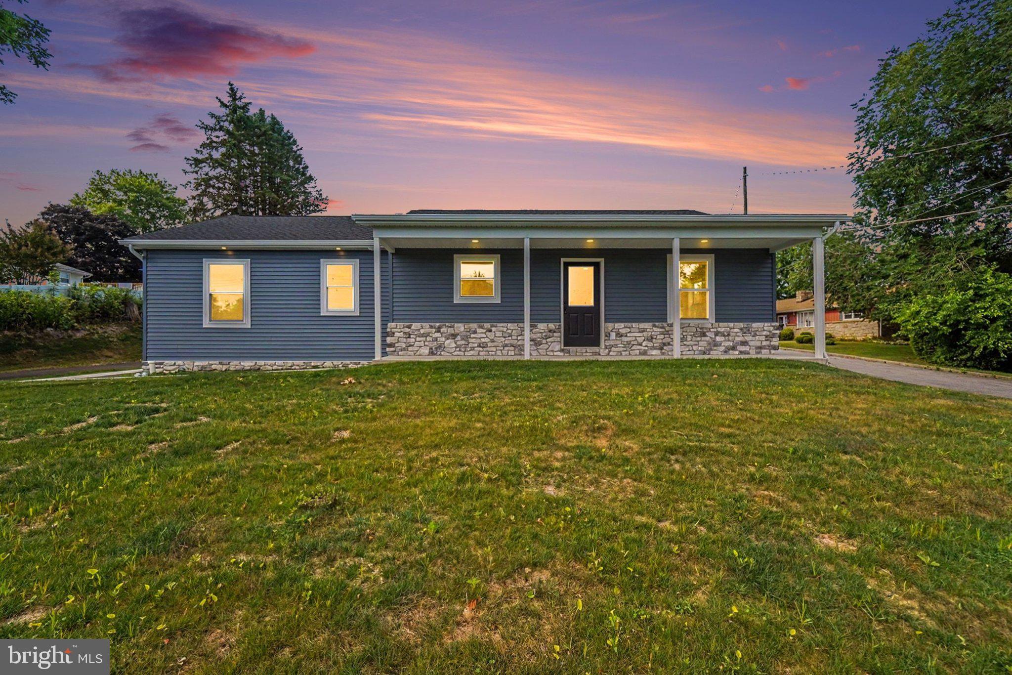 Perched high on a beautiful corner lot in a quiet neighborhood, this brand-new 3-bedroom, 2-bath home with a 1-car garage offers the perfect blend of style, comfort, and convenience. Designed for easy, low-maintenance living, the home features a smart first-floor layout, including a spacious primary suite that creates a private retreat you'll enjoy coming home to. Step inside to find luxury vinyl plank flooring throughout the main living areas, delivering durability and modern style, while soft carpet in the bedrooms adds warmth and comfort. The kitchen is the heart of the home, featuring granite countertops, hardwood cabinetry, and thoughtful finishes that make cooking and entertaining effortless. Enjoy quiet mornings or relaxing evenings on the covered front porch, the perfect place to take in the peaceful surroundings. The home also includes a massive unfinished basement, offering incredible potential to double your living space ideal for a future family room, gym, office, or guest area. Convenience is another major highlight. A playground is within walking distance, while schools, the hospital, grocery stores, and shopping are all just minutes away, making everyday errands and family life simple and accessible. Additional features include a high-efficiency heat pump with central air for year-round comfort, the convenience of a 1-car garage, and the benefit of low-maintenance living in a brand-new home. Opportunities like this don’t last! Secure your spot and move into a home designed to fit your lifestyle.