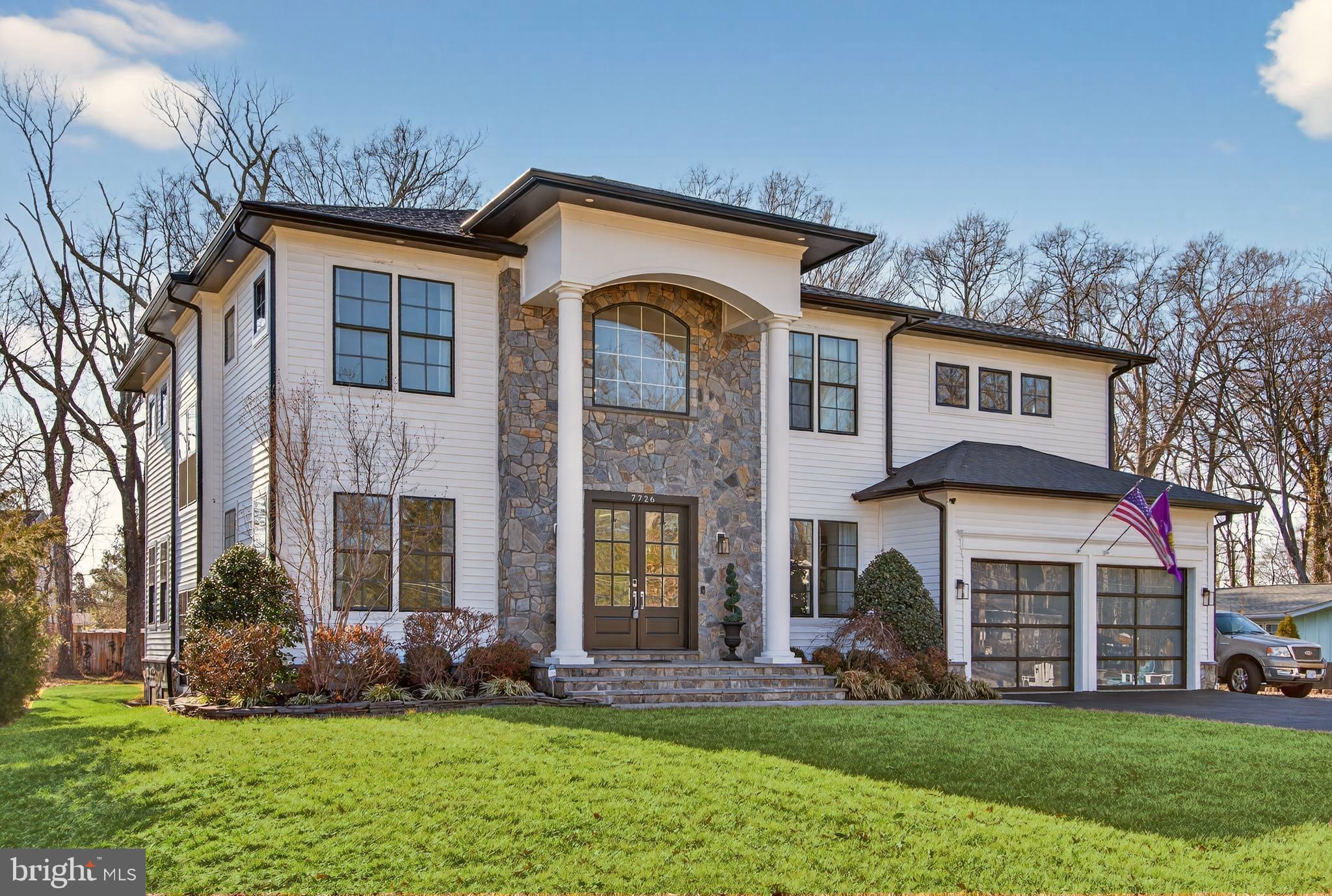 This exceptional custom-built home stands apart with superior craftsmanship, featuring 2×6 wall construction—well beyond standard 2×4 framing. Boasting nearly 5,500 square feet of beautifully designed living space, this impressive residence offers five spacious bedrooms and six full bathrooms across two thoughtfully laid-out levels—including two luxurious primary suites with full baths, one conveniently located on the main level and another on the upper level, providing ideal flexibility for multi-generational living or guest accommodations.  A striking stone façade with stately columns creates unforgettable curb appeal, setting the tone for what awaits inside. The home welcomes you with a bright, open floor plan, highlighted by soaring 10-foot ceilings, extensive crown molding, and elegant wainscoting throughout.  At the heart of the home is a stunning white chef’s kitchen, seamlessly flowing into expansive living and dining areas—perfect for both everyday living and entertaining. Generously sized bedrooms and luxurious bathrooms provide comfort and privacy, while refined architectural details elevate the overall living experience.  Step outside to a spectacular outdoor retreat featuring a grand paver patio and an impressive built-in fire pit—ideal for hosting gatherings or enjoying quiet evenings under the stars.  The full basement offers incredible potential, already framed and ready for completion, requiring only drywall and electrical to add significant additional living space and value.  This remarkable property delivers the perfect blend of quality construction, timeless elegance, and future opportunity.