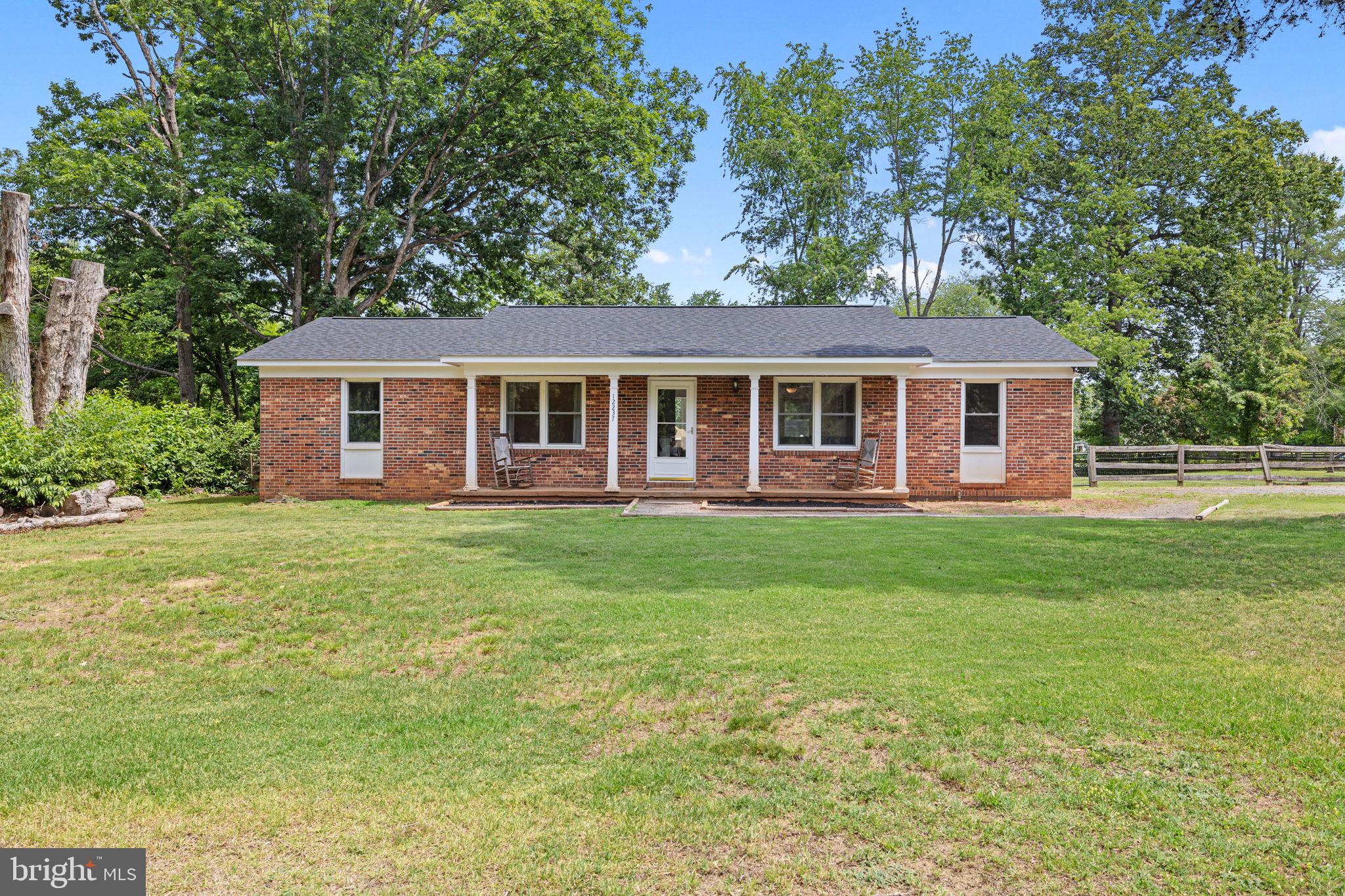 Welcome home to 12237 Randle Ln! This charming brick-front rambler provides comfort, convenience, and location! The home features one-level living with 3 bedrooms, 2 full bathrooms, and an additional spacious bonus room that can be used as a play area, office space, or 2nd living space! The primary bedroom is spacious, while easily accommodating a king-sized bed, it also features an updated master bathroom with a walk-in shower! The main living room is filled with natural light and flows seamlessly into the dining area with beautiful views of the large, private back yard! The laundry room is located off of the bonus room, it is spacious and can also be used for additional storage! Step outside onto the HUGE new deck, built in 2021, this is the perfect entertainment space to host cookouts, birthday parties, or family dinners during the Summer! The fenced-in backyard is very spacious and provides a peaceful and private area to enjoy. There are two 12' x 10' storage sheds located in the backyard providing that always-desired additional storage space! This home has been extremely well maintained and upgraded! Major upgrades include: brand new roof done at the end of 2024, new HVAC installed in 2020, the home was converted to an electric heat pump in 2021, and the crawl space is fully conditioned.

12237 Randle Ln is nestled on a corner lot in a quiet, friendly neighborhood on a cul-de-sac with no thru traffic. Just minutes from Main Street Culpeper and all the shops, eateries, and entertainment the Town of Culpeper has to offer! Minutes from Rt 29 making it super convenient for your work commute as well. This cozy home is sure to go fast, schedule your tour today!