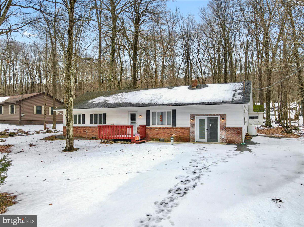 Welcome to your charming ranch home in Locust Lake! This residence has been lovingly cared for by its owners, who have invested time and care into making it a cozy haven. 3 bedrooms and 1.5 baths, this home offers a perfect blend of comfort and style. Step inside and discover a delightful bonus room with a built-in bar – an ideal space for entertaining friends and family. Don't miss the converted garage space located at the rear of the home, transformed into a huge game room for endless fun and relaxation. The heart of this home features a brand-new kitchen and updated baths, providing modern convenience and style. The bonus room comes complete with an epoxy floor, enhancing its appeal and durability. Imagine evenings spent in this inviting space, enjoying the built-in bar and creating lasting memories. Schedule your showing today!

HOA Association includes lakes that have fishing and activities throughout the season, a chalet that offers activities like sip n paint, live bandss, water slide for kids, ski slope for skiing or sledding.