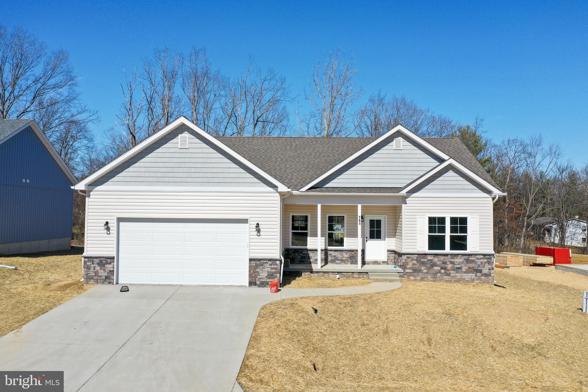 Introducing the 1441 Rancher D by Warfield Homes at Middle Creek Vistas. Have you been dreaming of a home that offers one-level living? Perhaps you have been strategizing to make a plan to retire in place. Warfield Homes Inc. has been building custom homes in the Northern Shenandoah Valley for over 30 years. You'll love the openness of the floor plan, the 9' ceilings & the luxury vinyl plank flooring. The kitchen is beautifully finished with soft close cabinets, stainless steel appliances & upgraded countertops. This floor plan features a walk-in pantry. The primary suite features a walk-in closet, dual sinks & a custom
shower with floor to ceiling tile. A $2,000 closing cost credit & a free appraisal are available with the use of the builder's preferred lender. The completion time frame is approximately 120 days from the issuance of the county building permit.