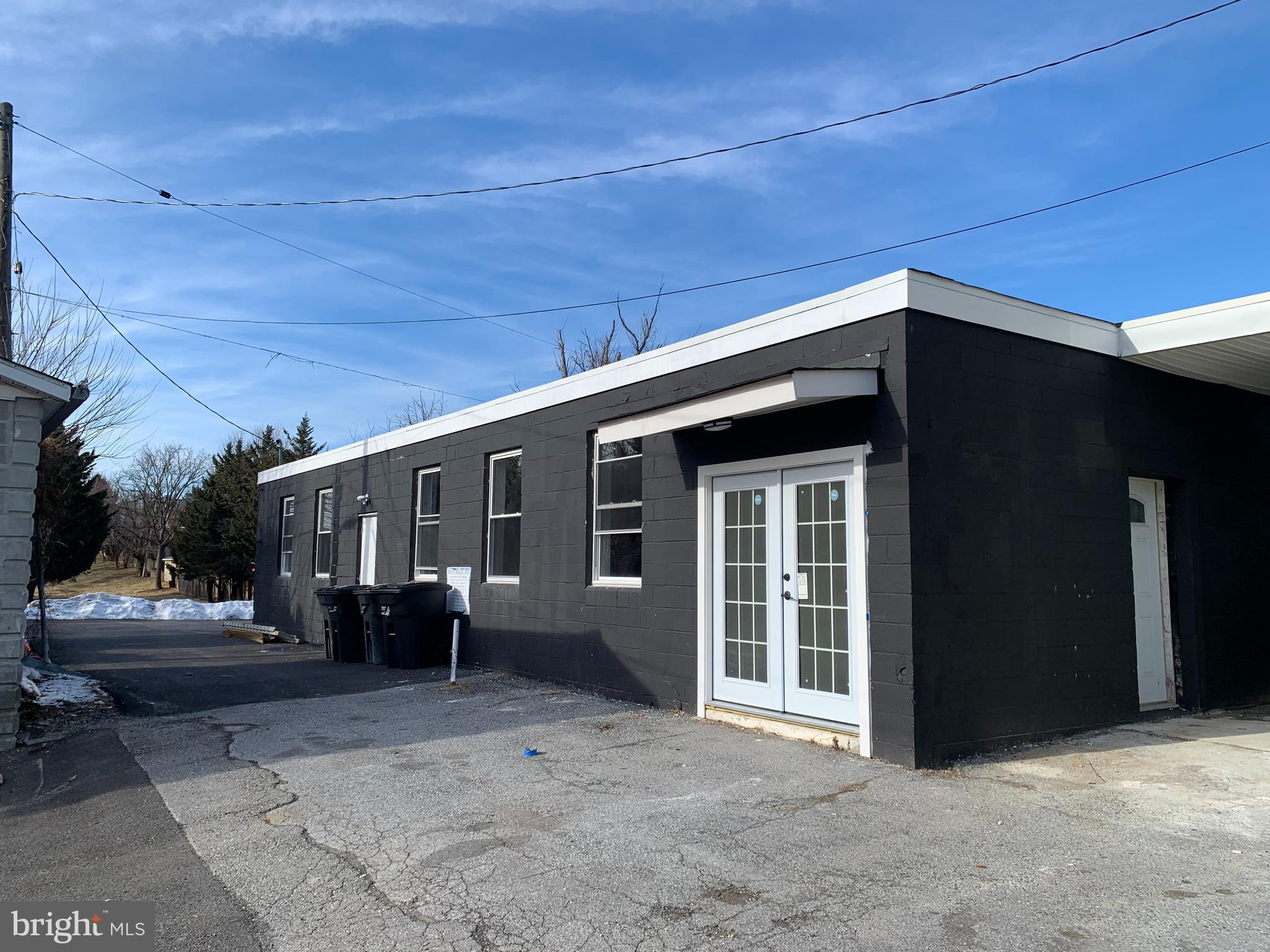 EXCEPTIONAL mixed-use commercial/multi-unit property located on highly traveled Harford Road/Hamilton & Lauraville community. Offering multiple income streams and future development potential. This unique offering includes a fully renovated 4-unit commercial building, a separated mixed use structure and an expansive 1.14 acre lot with 2 plots connected to this land and two points of ingress/egress- a rare find in this corridor. 

This Property has been pre-appraised (priced to sell). The 4,960 square foot multi-unit has 4 units all newly renovated.  ALL units are currently tenant occupied with a rental income over $5,000.

Commercial property is zoned for mixed use and includes bathrooms, and potential office space. Commercial building exterior is freshly painted with new trimmings. Potential rental income is $2,500-$3,000/month

Land totaling 1.14 acre including two separate/buildable plots. Many possibilities and multiple income streams. This enormous property is ideal for investors seeking stable income owner-operators, or developers looking for a property with scale, visibility, and growth potential. Conveniently located near major commuter routes, public transportation and established neighborhoods. Don't miss this opportunity.