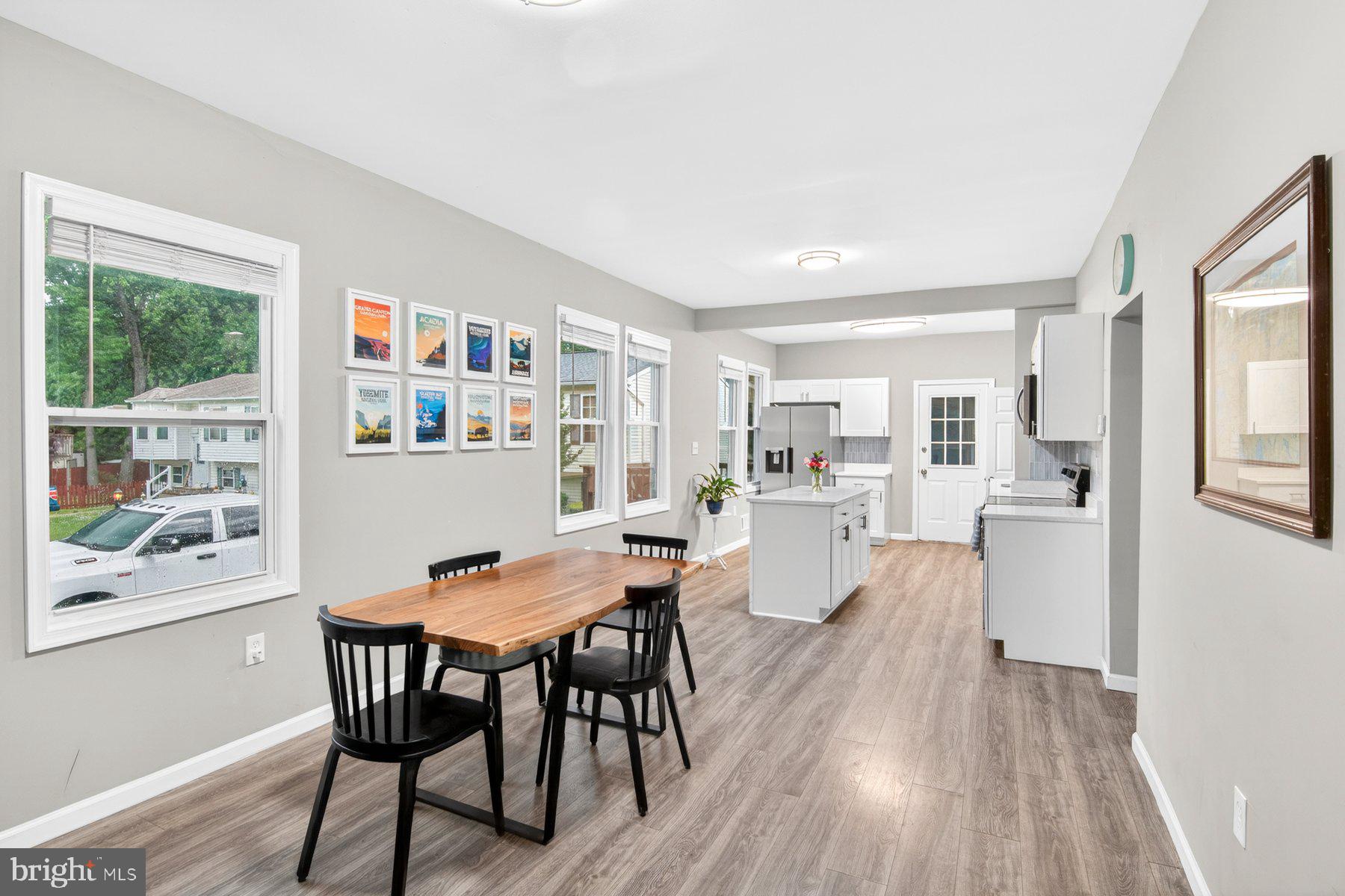 Welcome to this stunning, move-in ready 3-bedroom, 2-bath Cape Cod nestled in the highly desirable Edgemere community of Baltimore County. This home offers modern finishes, an open-concept layout, and versatile living spaces designed for everyday comfort.
The main level features a spacious living room, dining area, and updated kitchen with a large center island, quartz countertops, stainless steel appliances, and generous cabinet storage. A spacious mudroom connects seamlessly to your brand-new multi-level deck — perfect for morning coffee or al fresco dining — overlooking a generously sized, fully fenced backyard oasis.  A main-level bedroom and updated full bath round out the first floor.
Upstairs offers a second bedroom with an adjoining bonus room — great for a home office or sitting area. The finished lower level adds a third bedroom, family room, laundry, and storage.
Outside, a private two-car driveway includes a NEMA 14-50 (240V/50-amp) EV charging outlet. The oversized shed provides additional storage.
Located about 1 mile from North Point State Park and 1.5 miles from Sparrows Point Park, with easy access to hiking trails, beaches, fishing, a waterfront pier, dining, and Bear Creek Marina. Quick commuter access via North Point Rd (MD-151) and I-695.
Schedule your showing today — homes in this small town feel community don’t last long.
