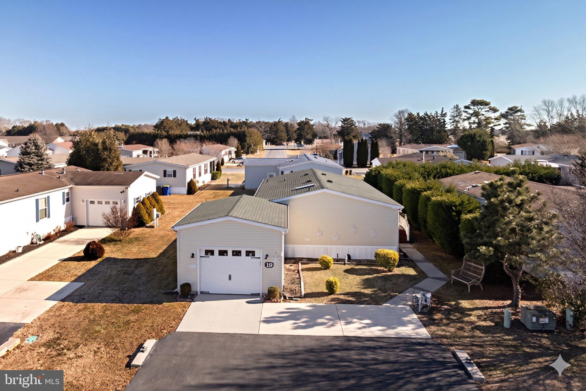 Welcome home to this beautifully maintained, move-in-ready gem where you won’t need to change a thing! Enjoy bright, spacious living throughout! The home features a primary bathroom with a convenient connection to the laundry room, making everyday living effortless. Located just minutes from the beaches, this home offers the perfect blend of comfort and coastal lifestyle. Within a community rich with amenities, you’ll have access to a vibrant clubhouse with weekly activities, an indoor saltwater swimming pool, dog park, bocce ball court, and easy access to the Lewes–Georgetown Walking Trail. Residents also receive a yearly pass to enjoy the outdoor pool at Colonial East! Recent upgrades include a brand new washer and dryer installed 1/17/26, new carpet throughout, as well as new front door and door frame installed in 2023. This is easy living at its finest — just unpack and start enjoying everything this community has to offer!