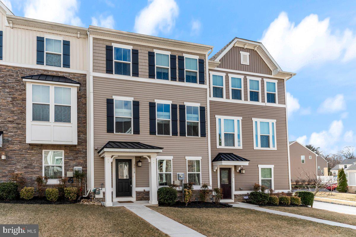Welcome Home to the coveted Stargazer Village, a nicely designed community tucked amid the pastoral setting in West Bradford Township, and the Downingtown School District. This peaceful setting features open green space with a backdrop of mature trees, and community sidewalks all on a circular drive with no through traffic. This incredibly Stylish Townhome was built in 2018, and features an open floor plan on the main level with beautiful hardwood floors, a gorgeous kitchen with granite island and counters, gas range with overhead microwave, dishwasher, refrigerator(all stainless steel), and upgraded cabinets. The large dining area includes a slider to the large deck with breathtaking views, and the family room includes an alcove which makes a great space for a future wine and beverage bar. Take a walk upstairs to the large primary bedroom with a spacious walk in closet,  primary bathroom with a granite double sink vanity and tiled shower, two additional bedrooms, spacious hall bathroom, and the hallway laundry closet with washer and dryer included. The entry level includes a recreation room that can also make a great office or exercise room, a convenient powder room, a large coat and shoes closet, and the entrance into the two car garage which also includes a two vehicle driveway. With handsome curb appeal that includes stone trim, this home includes 9 foot ceilings on the two main floors, and an interior fire sprinkler system for safety and economic homeowner's insurance. This original owner has taken very good care of this 7 years young beauty.  It's carefree and stylish living without the worries or hassles of snow removal and lawn care. The location is truly the best of both worlds, in the respect that you have a quiet country setting, yet you're only minutes(7 miles) from the West Chester Borough dining and shopping experience, and only 12 miles to Exton. Also minutes to the Downingtown amenities with easy access to route 322 and route 30. You're also close to the Stroud and ChesLen Preserves for hiking in spectacular beauty, and the historic Marshalton Village area. The community includes a paved walking trail and a tot lot playground. This neighborhood development is one of Chester County's best kept secrets. The minute you enter, you'll know you're home ! Low maintenance living at it's finest !
