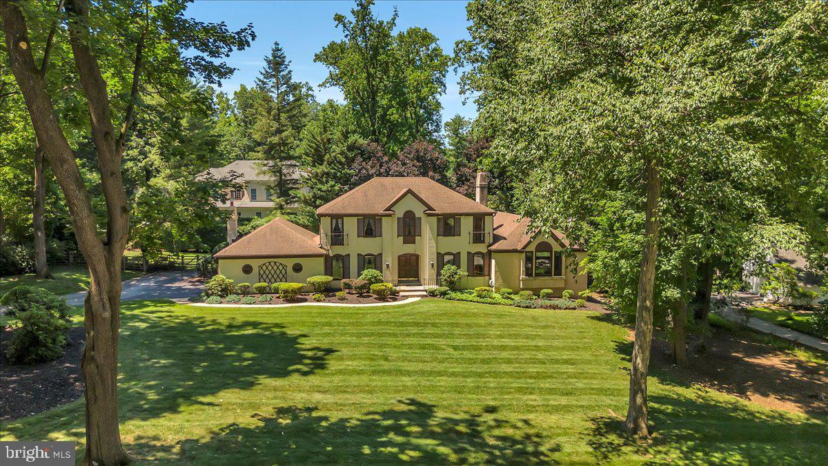 Welcome to 4 Clayton Place, where tradition meets privacy and convenience.  Nestled on a private cul-de-sac within the Greene Countrie development of Newtown Square, this home has it all including four bedrooms, two and a half baths, approx 5,000 square feet of living space, a private oasis including a heated pool, spa, and approx 1,300 square feet of deck space, and a two car attached garage, all on appox 0.8 acres of flat land. Immediately notice the stunning curb appeal of this classic French Colonial surrounded by pristine, mature landscaping. The expanded first floor makes for comfortable living spaces, including an updated kitchen with gorgeous natural wood cabinetry and stainless steel appliances, a large dining room, a family room with wood burning fireplace, living room with gas fireplace, and an unbelievable expansion which includes a large office/library with ornate built-ins and a sun soaked all seasons room leading out to the rear deck. The large primary suite includes an en-suite bathroom and spacious walk-in closet. The rest of the second floor screams functionality, and includes three additional bedrooms with deep closets, a hall bathroom with tub, and hall linen and storage closets. For additional recreational space, don't miss the finished basement which consists of three different usable finished spaces plus two large unfinished storage rooms and a wine cellar. Additional notes: first floor and basement addition completed in 2002, surround sound in kitchen, office, all seasons room and rear exterior, all appliances updated in the past couple years. Enjoy the convenience of this amazing location which is minutes from Newtown Square town center, Ellis Preserve, top private golf (including Aronimink, Overbrook, and Waynesborough), amazing schools (including Episcopal Academy, Notre Dame, Agnes Irwin), easy access to Bryn Mawr and Wayne, and access to 476 and 95 in minutes.
